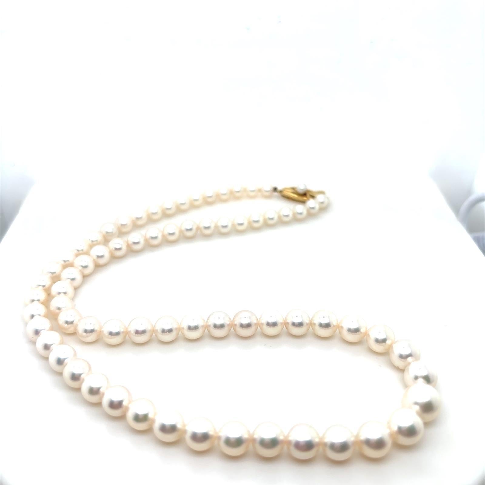 A Mikimoto graduated pearl yellow gold necklace, circa 1980

Designed as a single graduated cultured Akoya pearl strand of 18 inches in length. The largest being 8mm to the smallest at 5mm to the reverse of the necklace.

Finished with a 14 karat