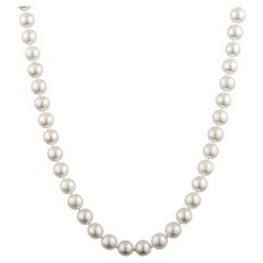 Mikimoto Collier de perles de culture nouées avec fermoir filigrane en or jaune 18 carats