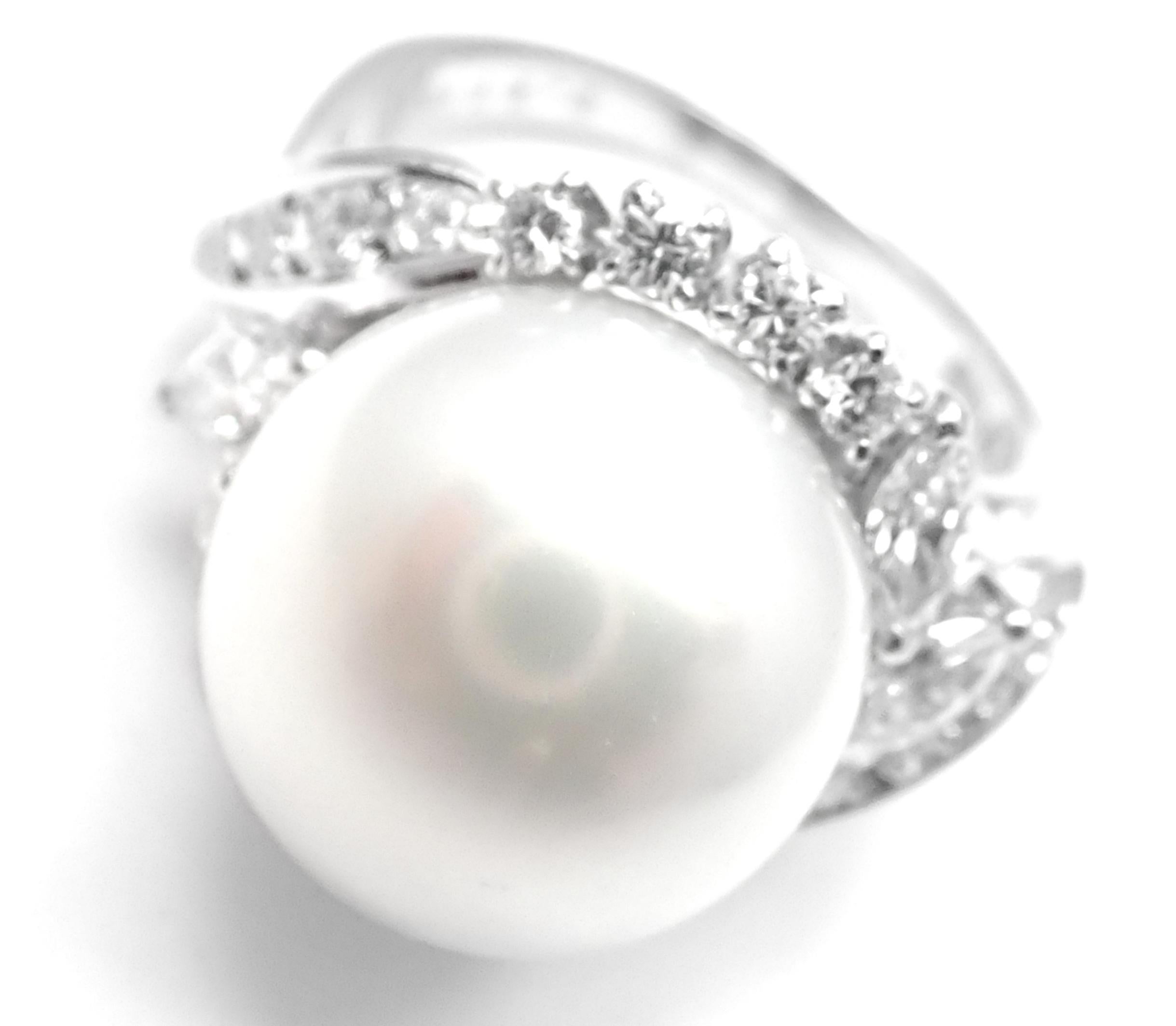 Platinum Diamond Large 12.5mm South Sea Pearl Ring by Mikimoto. 
With Diamonds VS1 clarity, G color total weight approximately .69ct
1 South Sea large pearl 12.5mm each
Details: 
Ring Size: 5 1/4, Resize Available
Weight: 10.7 grams
Stamped
