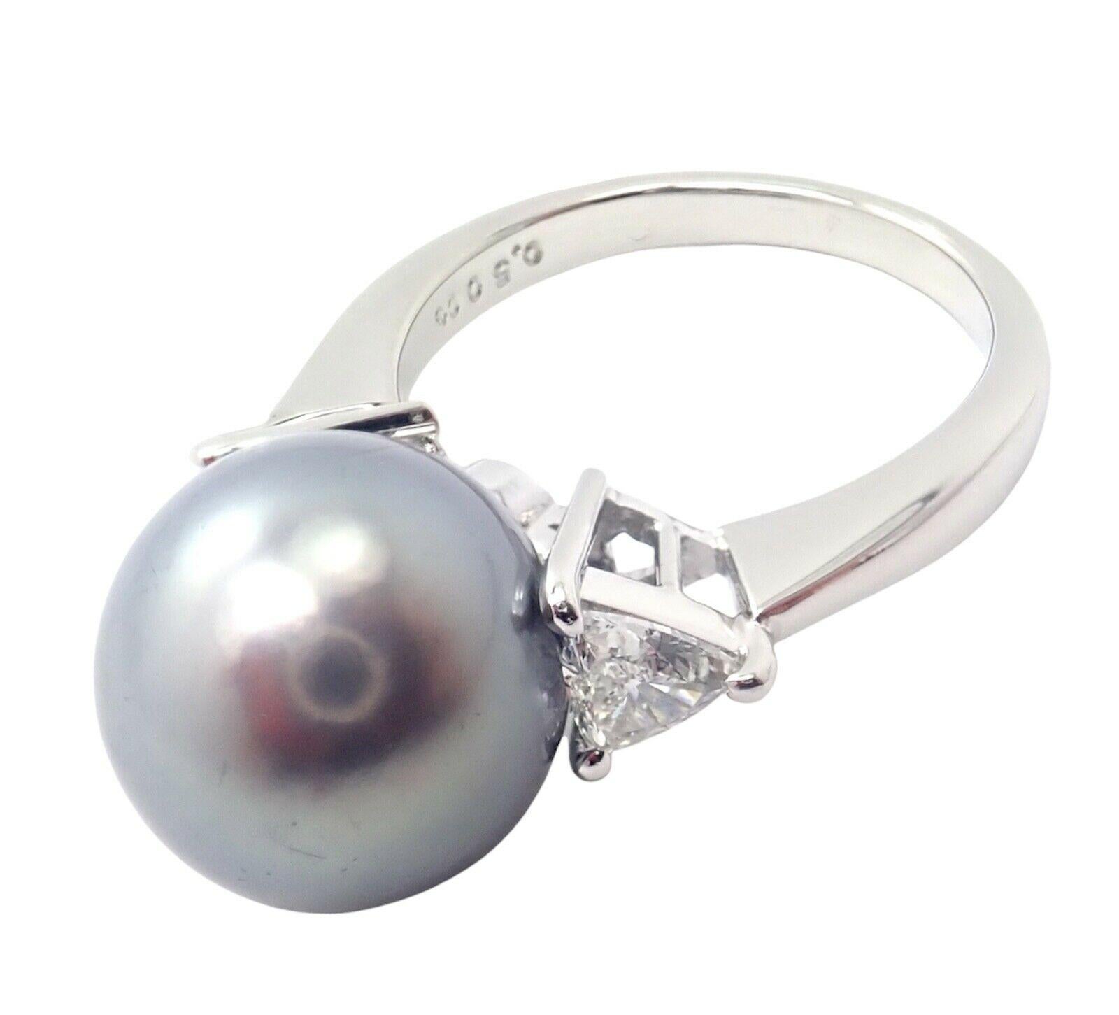 Platinum Diamond Large 12mm Tahitian Pearl Ring by Mikimoto. 
With 2x Trillion cut VS1 clarity, E color diamonds total weight approx. .50ct
1 x 12mm Tahitian South Sea Pearl 
Color Gray
Quality Grade A+
Details: 
Ring Size: 5.5
Weight: 7.9