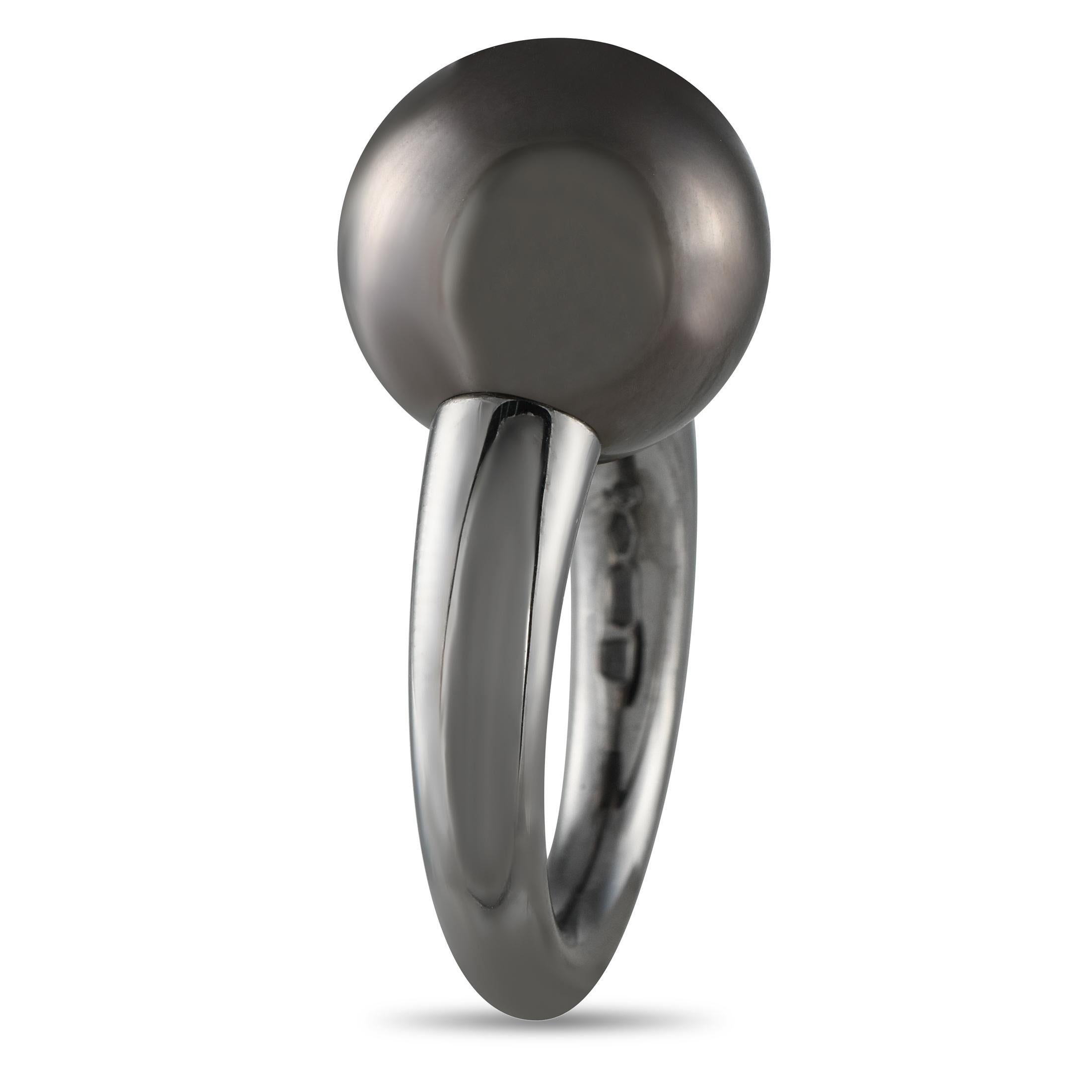 An endlessly elegant Mikimoto ring. This piece's minimalist band holds a single black South Sea pearl, measuring 14.7mm in diameter. Mikimoto's black South Sea cultured pearls are among the most coveted in the world, desired for their edgy and