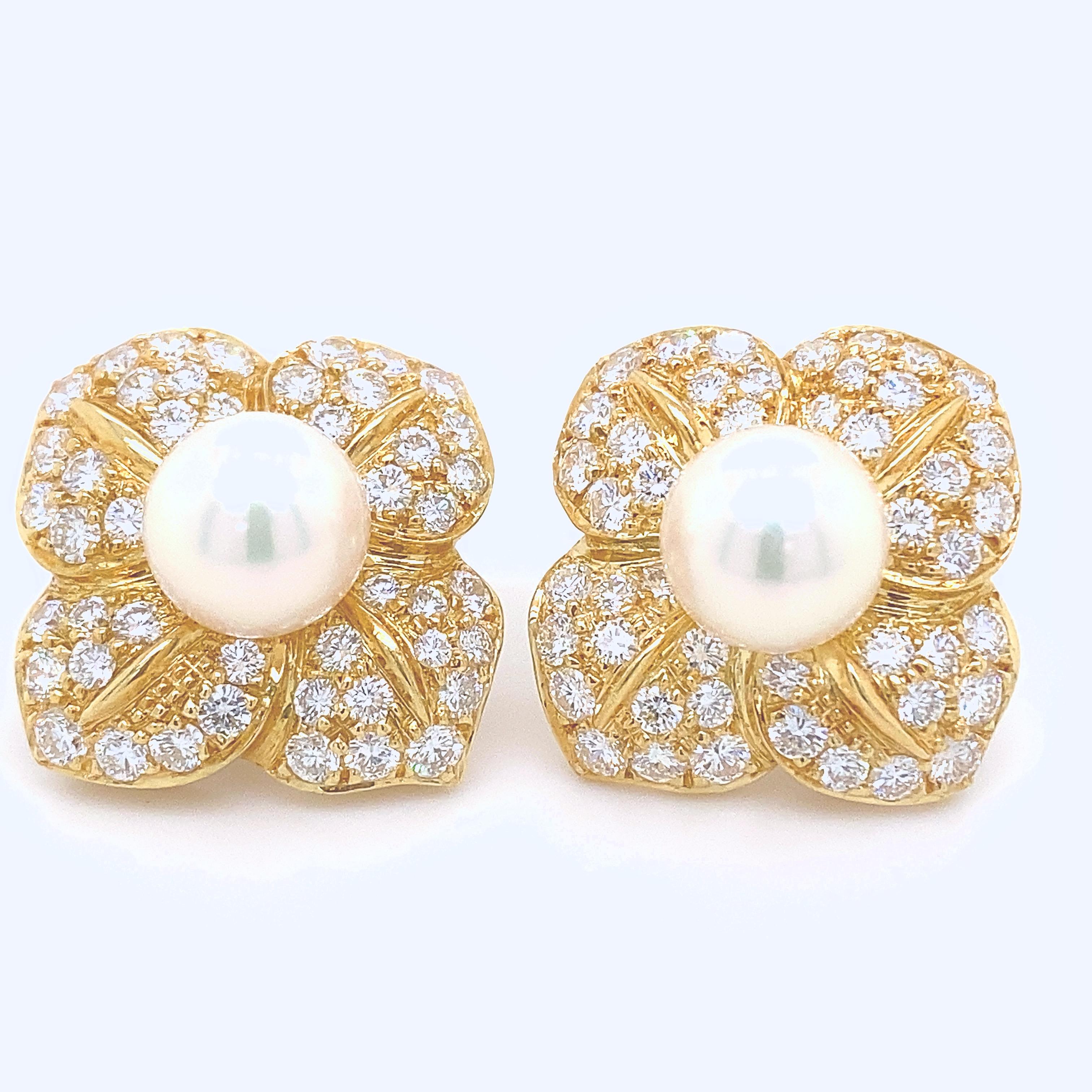 Mikimoto Diamond & Pearl Floral Earrings
Style:   Post for Pierced Ears with Clip
Metal:  18kt Yellow Gold
Size:  22 X 22 MM / 1 inch 
TCW:  3.37 tcw
Main Diamond:  46 Round Diamonds 3.37 tcw
Color & Clarity:  G / VS
Pearls:   2 Round 8.5 - 9 MM AA