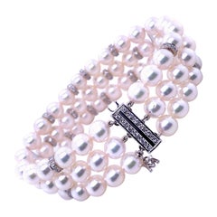 Bracciale Mikimoto con perle e diamanti in oro bianco 18 carati