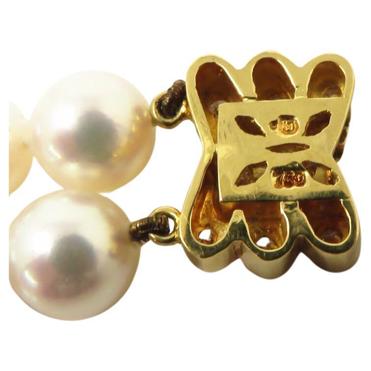 Experience the luxurious allure of this Mikimoto bracelet, marked with the 750 and the prestigious Mikimoto maker's mark. Featuring elegant pearls approximately 6.8-7mm in size and accented by 33 sparkling diamonds, this bracelet is a true statement