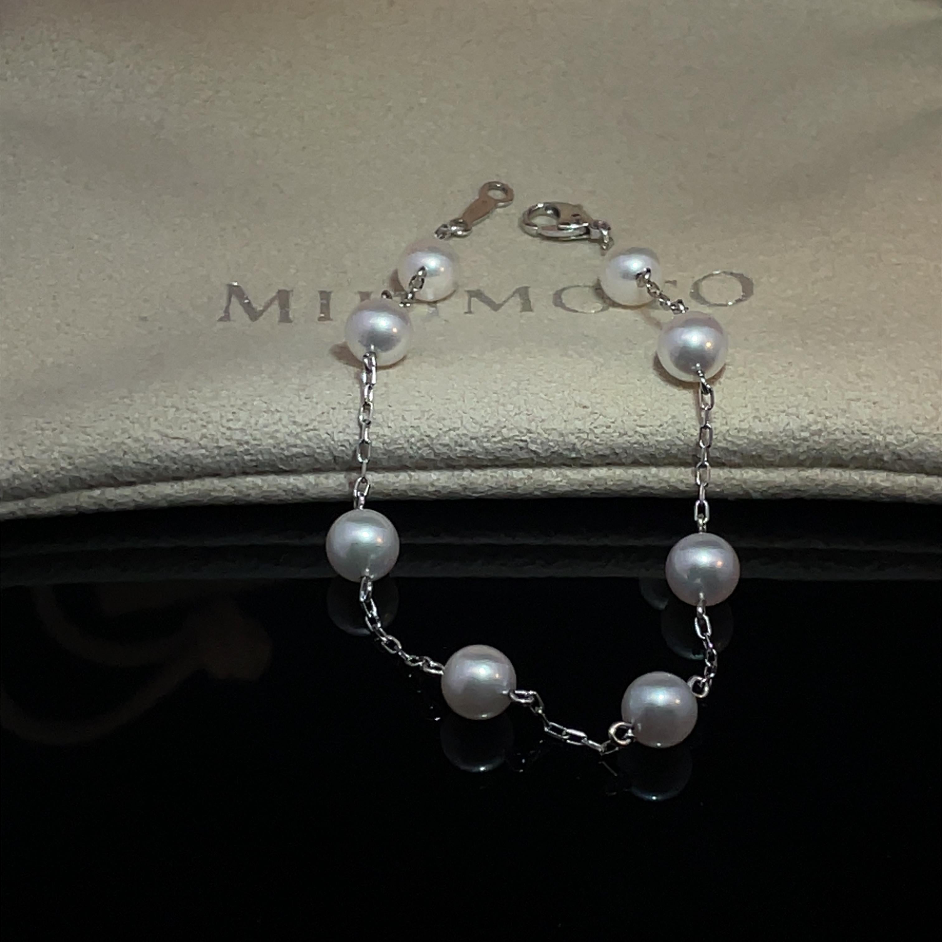 Indulge in the timeless elegance of the Mikimoto White Pearl Bracelet, a stunning accessory that effortlessly elevates any ensemble. Crafted with meticulous attention to detail, this exquisite bracelet features eight lustrous white pearls, each