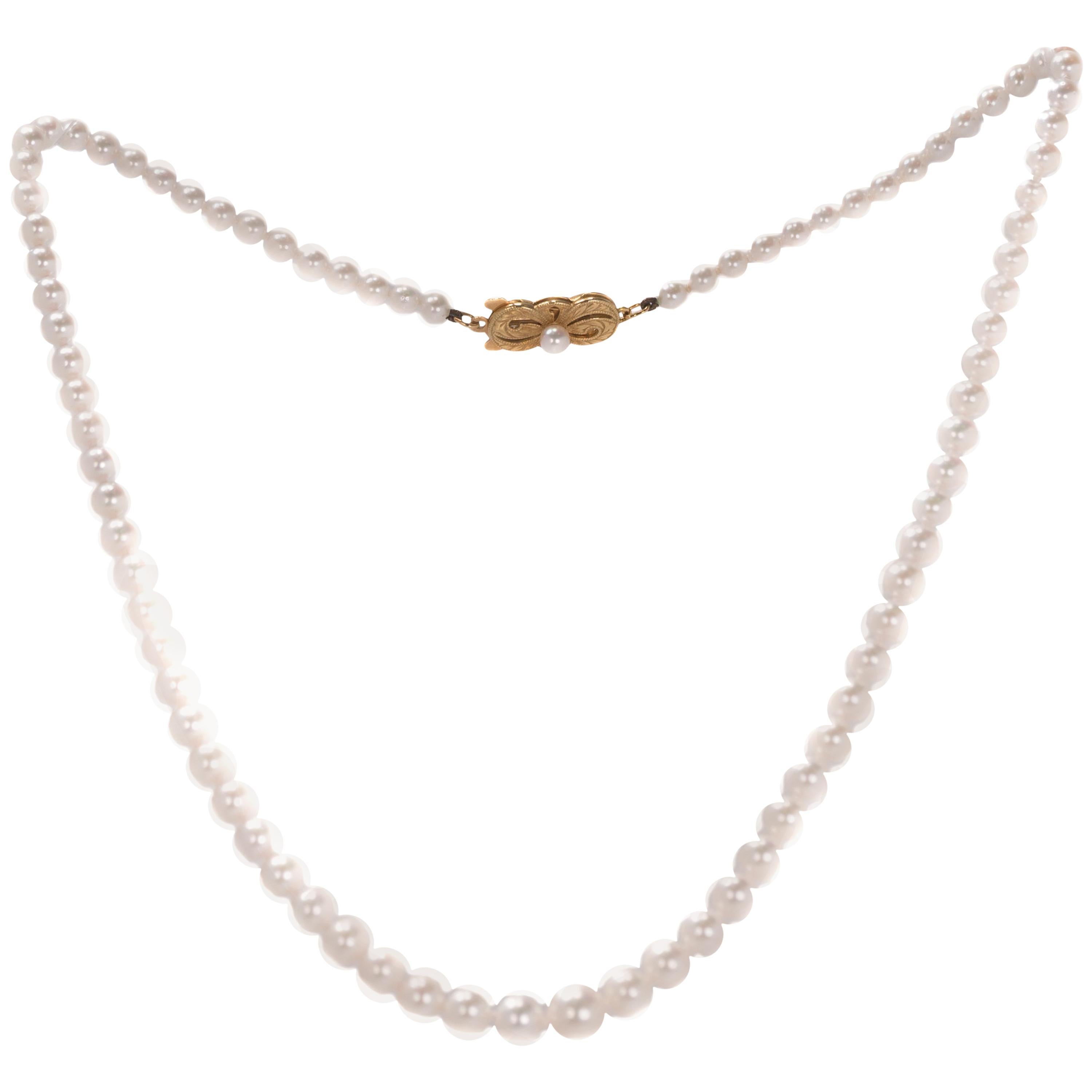 Mikimoto Pearl Necklace with 18 Karat Yellow Gold