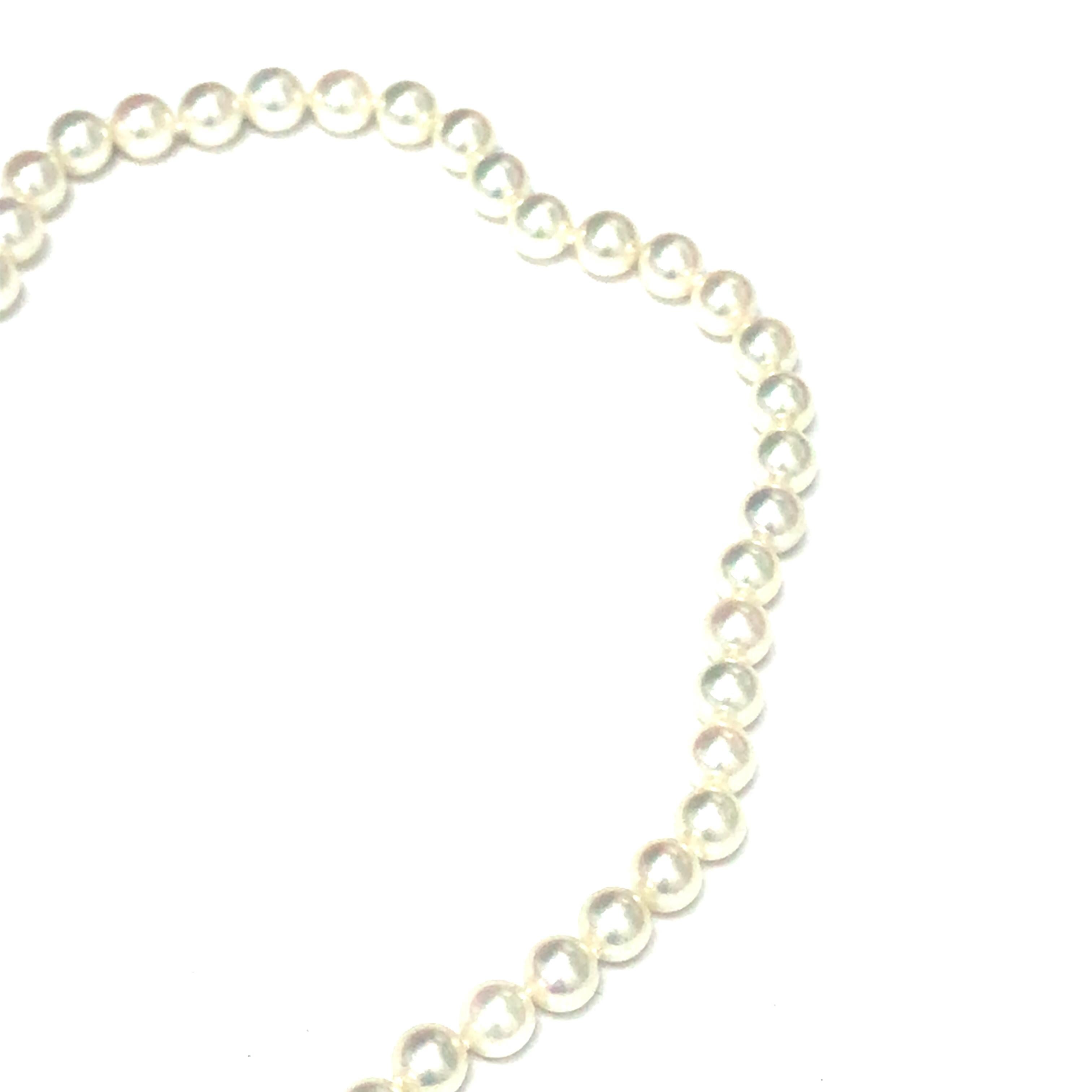 Round Cut Mikimoto Pearl Strand 18K Yellow Gold Bow Clasp For Sale