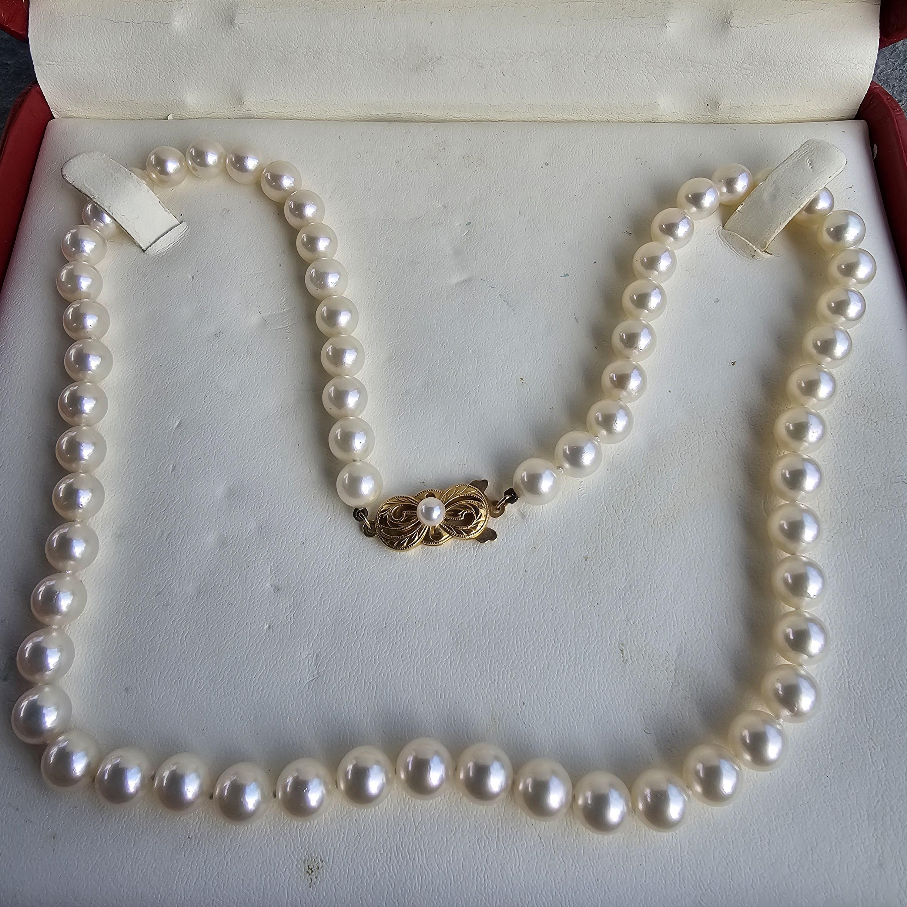 Collier de perles Mikimoto en or jaune 18k 6.5mm à 7mm Akoya 18