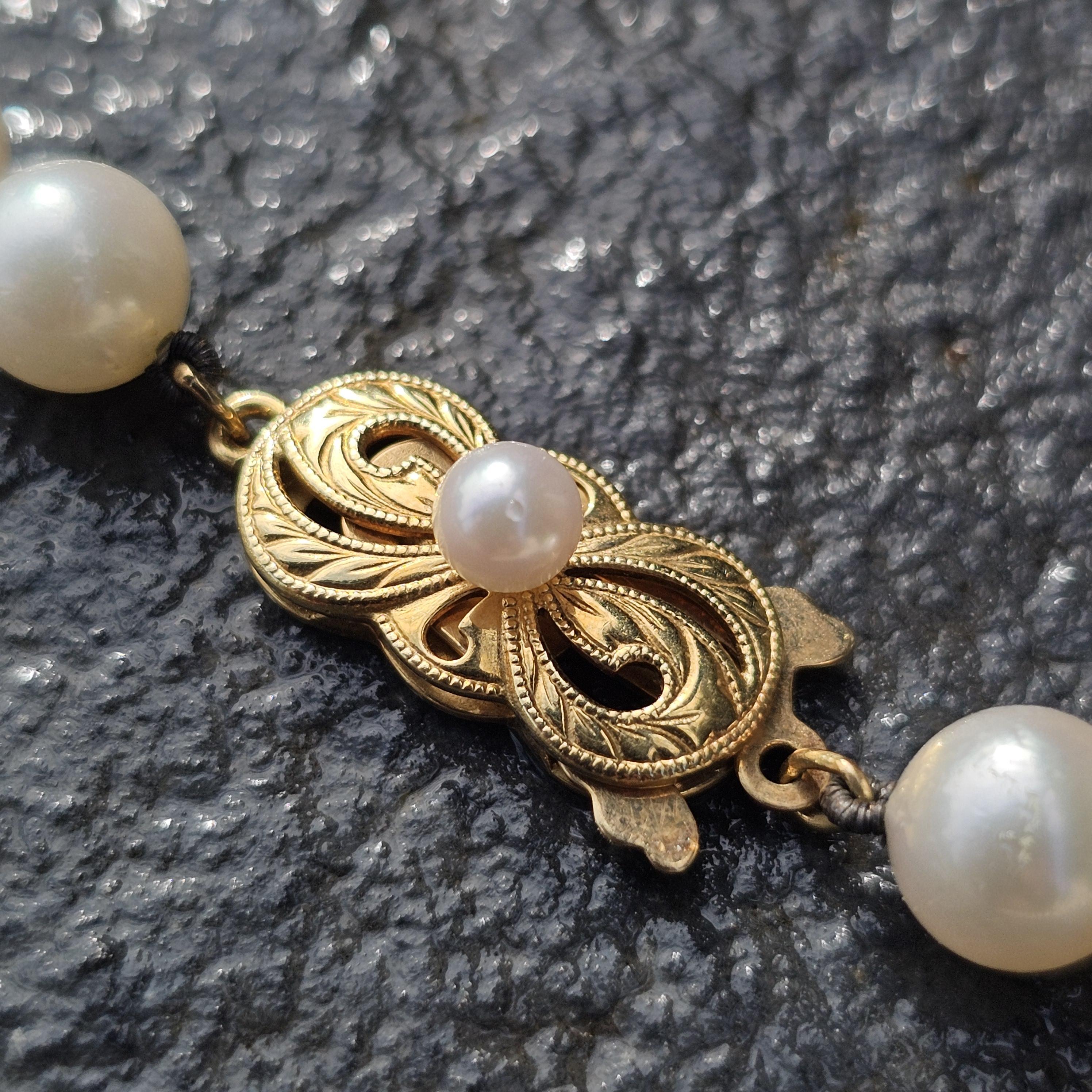 Collier de perles Mikimoto en or jaune 18k 6.5mm à 7mm Akoya 18