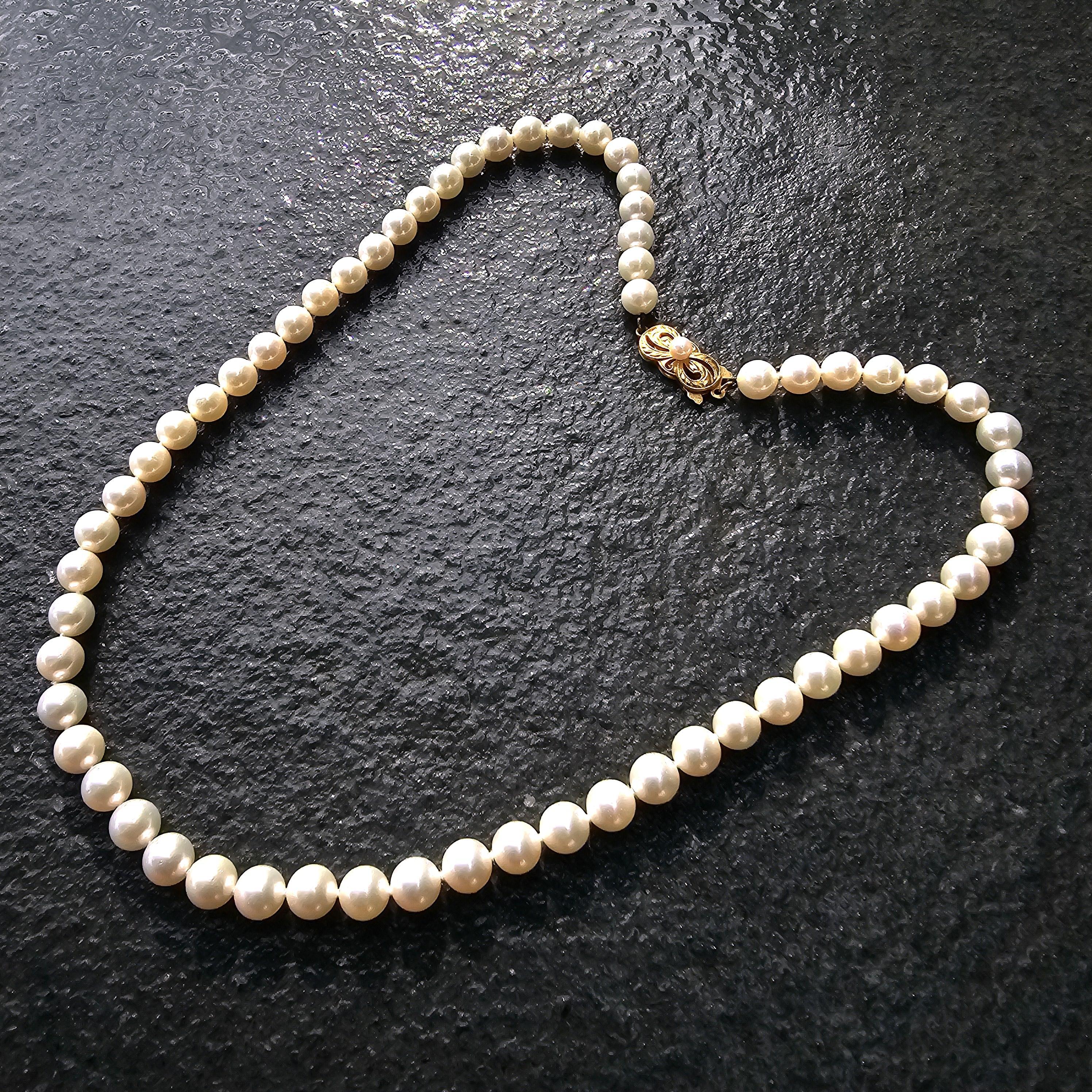 Collier de perles Mikimoto en or jaune 18k 6.5mm à 7mm Akoya 18