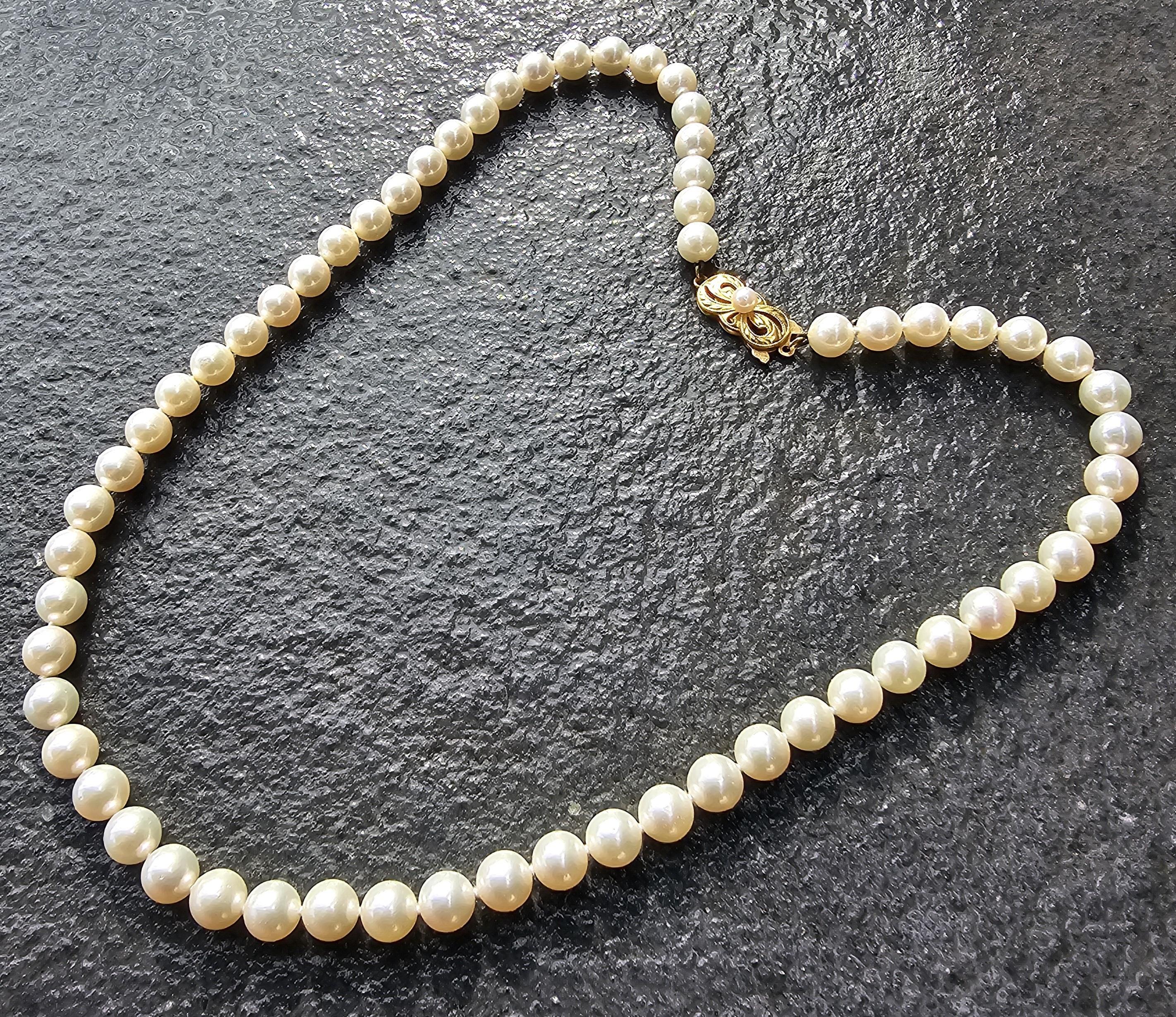 Collier de perles Mikimoto en or jaune 18k 6.5mm à 7mm Akoya 18