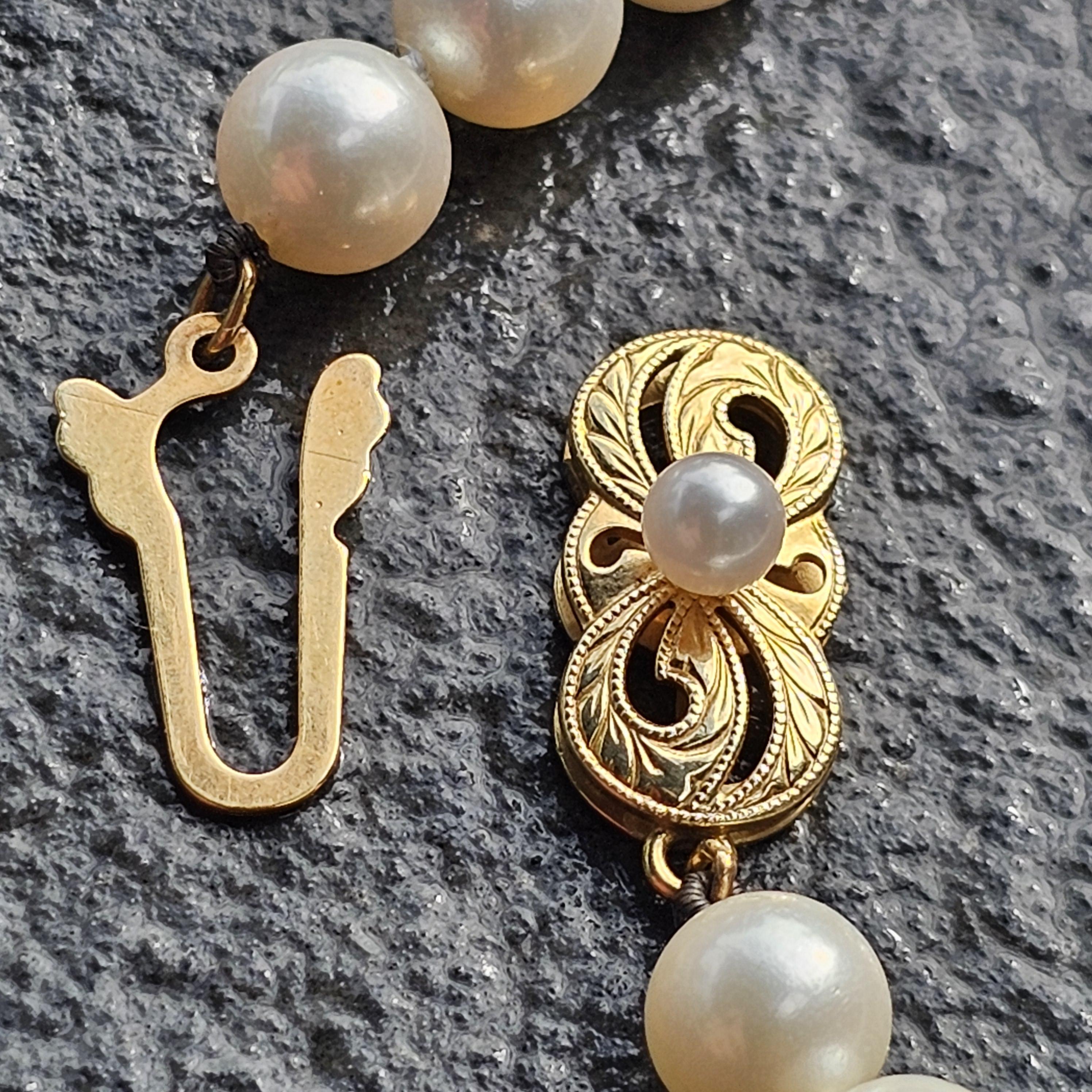 Collier de perles Mikimoto en or jaune 18k 6.5mm à 7mm Akoya 18