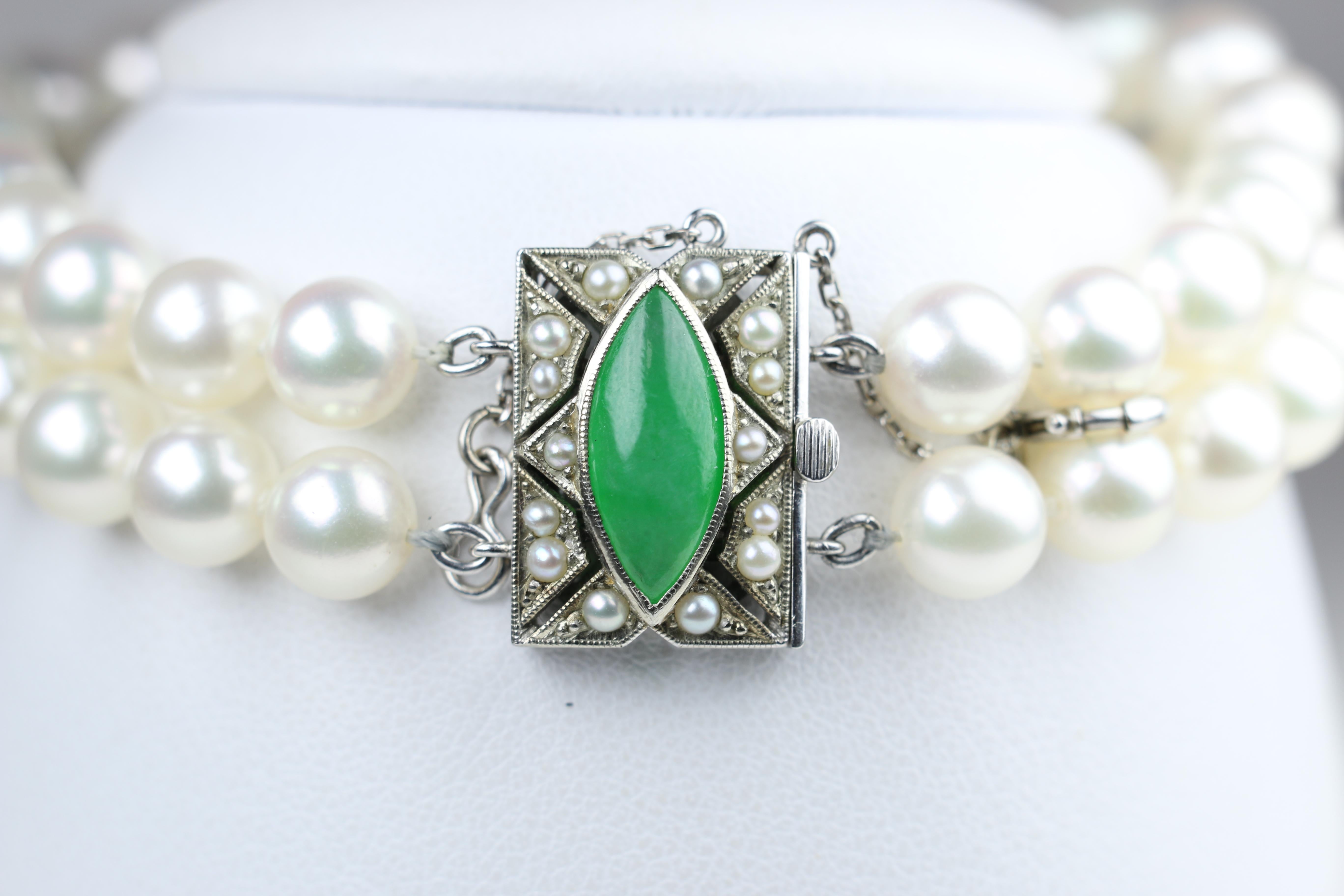 14K White Gold Pearl Jade White Gold Mikimoto Bracelet
Clasp is Deco in look with a beautiful piece of oval jade.  
Safety Clasp 
Stamped White Gold M K14
