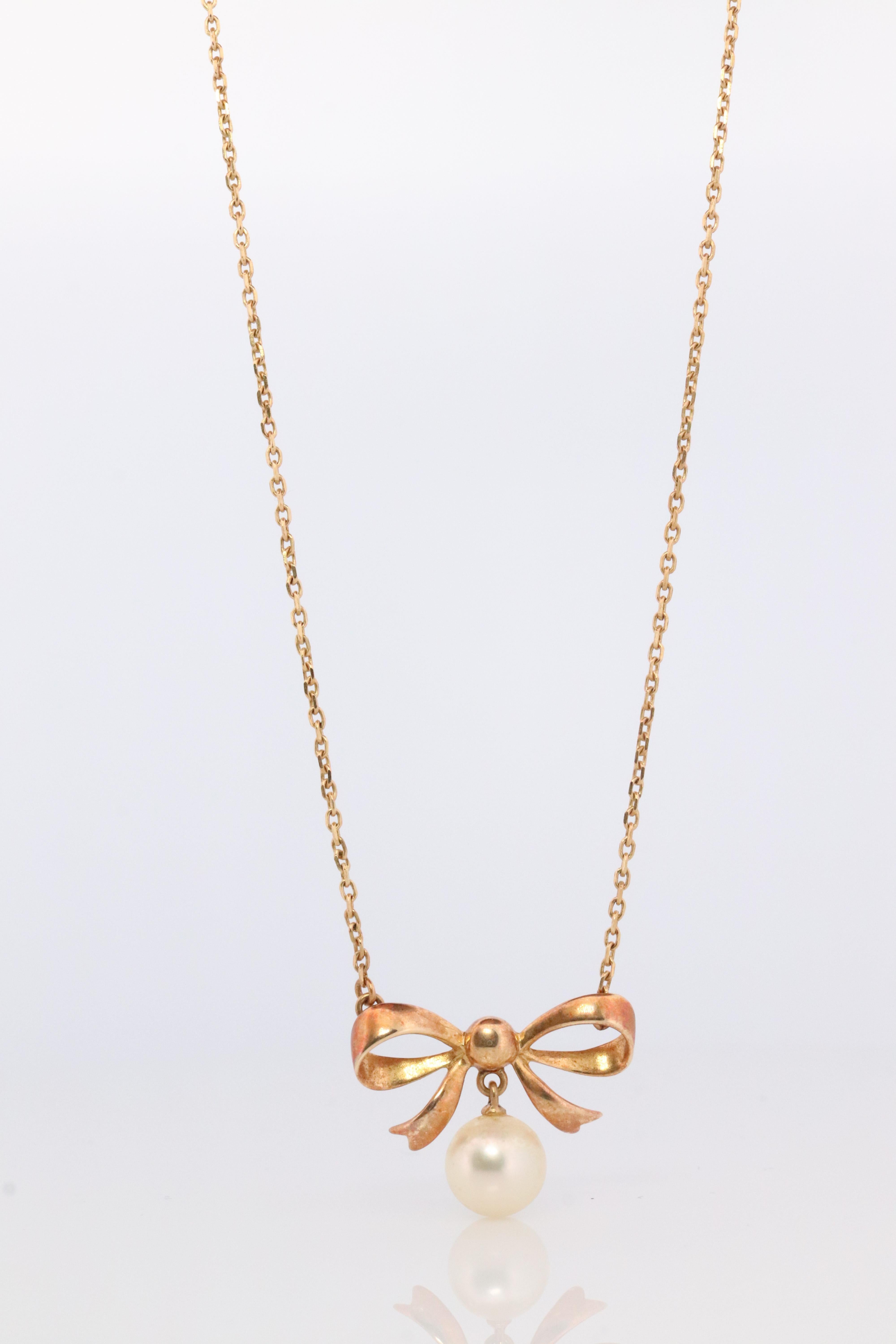 Round Cut Mikimoto Pendant. Vintage 14k Gold Mikimoto BOW Pearl Diamond Necklace. For Sale