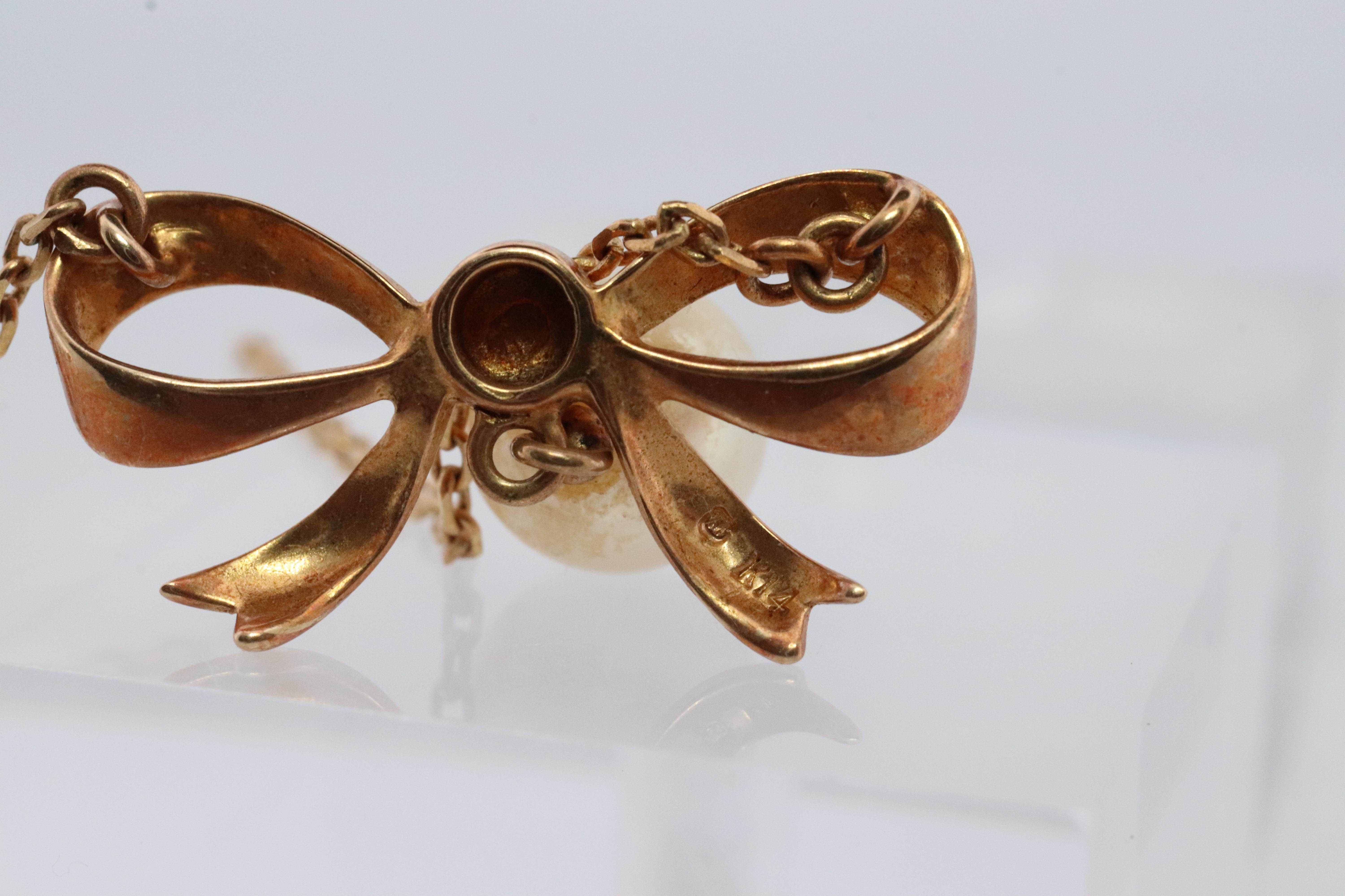 Mikimoto Pendant. Vintage 14k Gold Mikimoto BOW Pearl Diamond Necklace. For Sale 1
