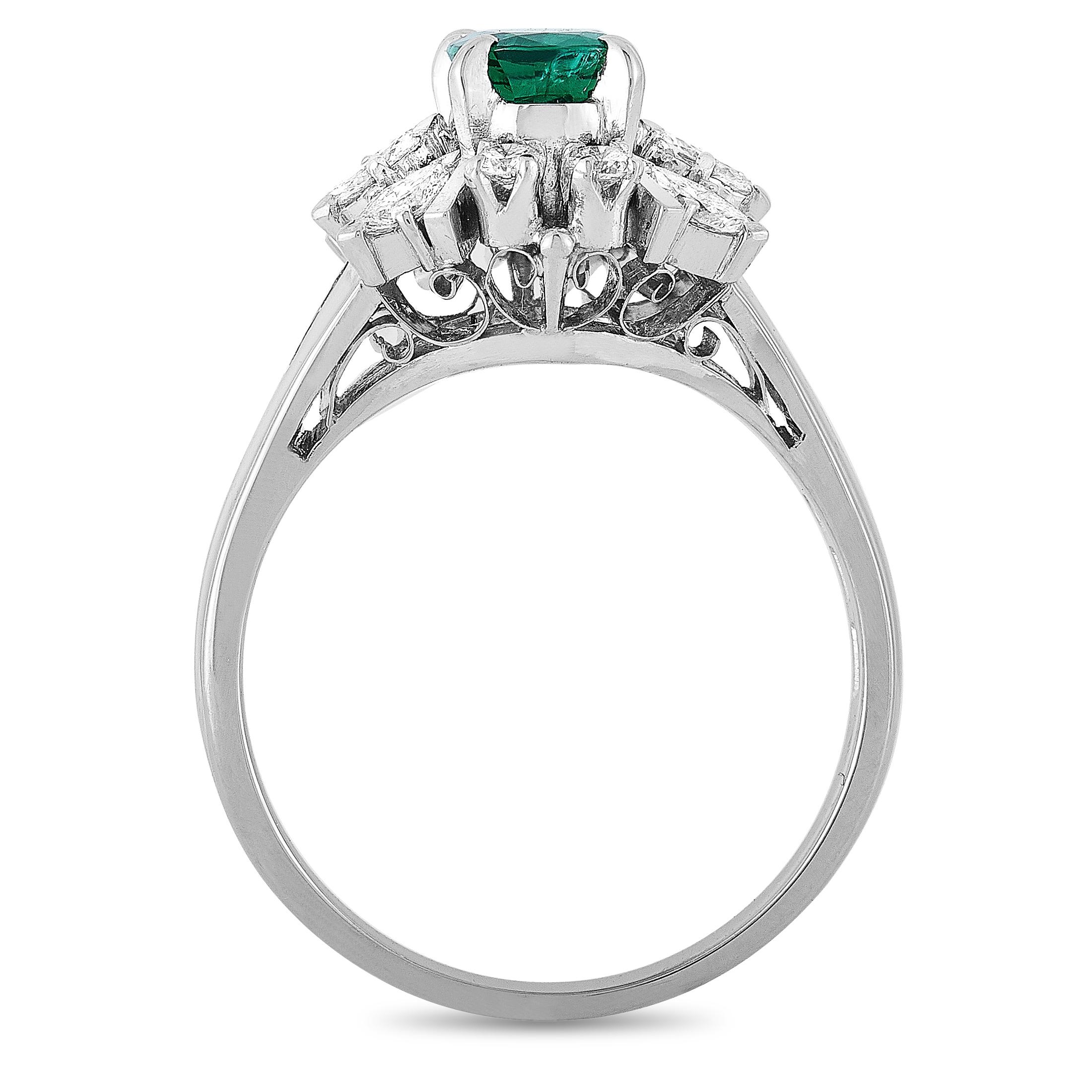 This Mikimoto ring is crafted from platinum and weighs 5.1 grams, boasting band thickness of 1 mm and top height of 8 mm, while top dimensions measure 12 by 9 mm. The ring is set with a 0.62 ct emerald and a total of 0.50 carats of diamonds.
Ring