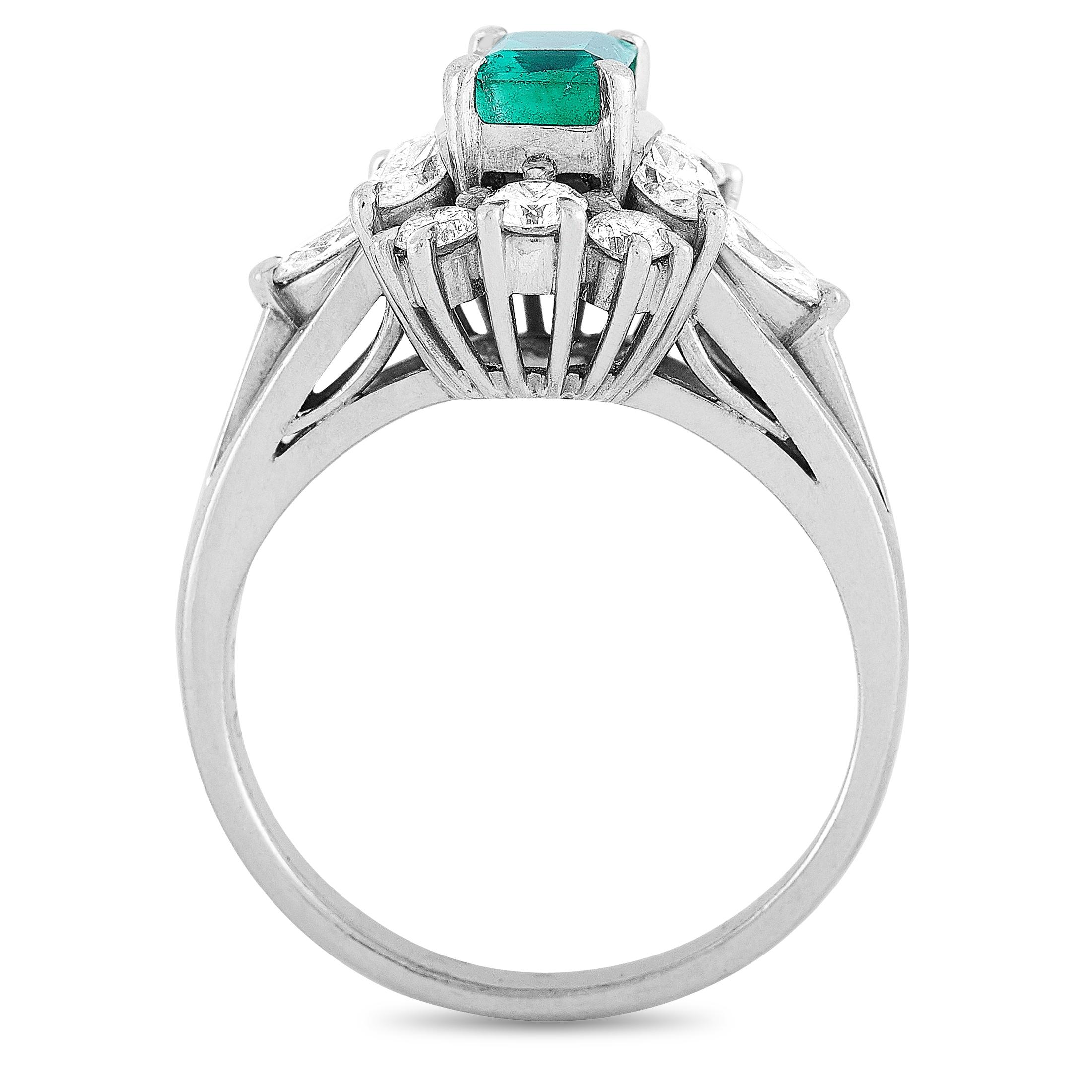 This Mikimoto ring is crafted from platinum and weighs 5.4 grams, boasting band thickness of 2 mm and top height of 9 mm, while top dimensions measure 14 by 11 mm. The ring is set with a 0.54 ct emerald and a total of 0.66 carats of diamonds.
 
