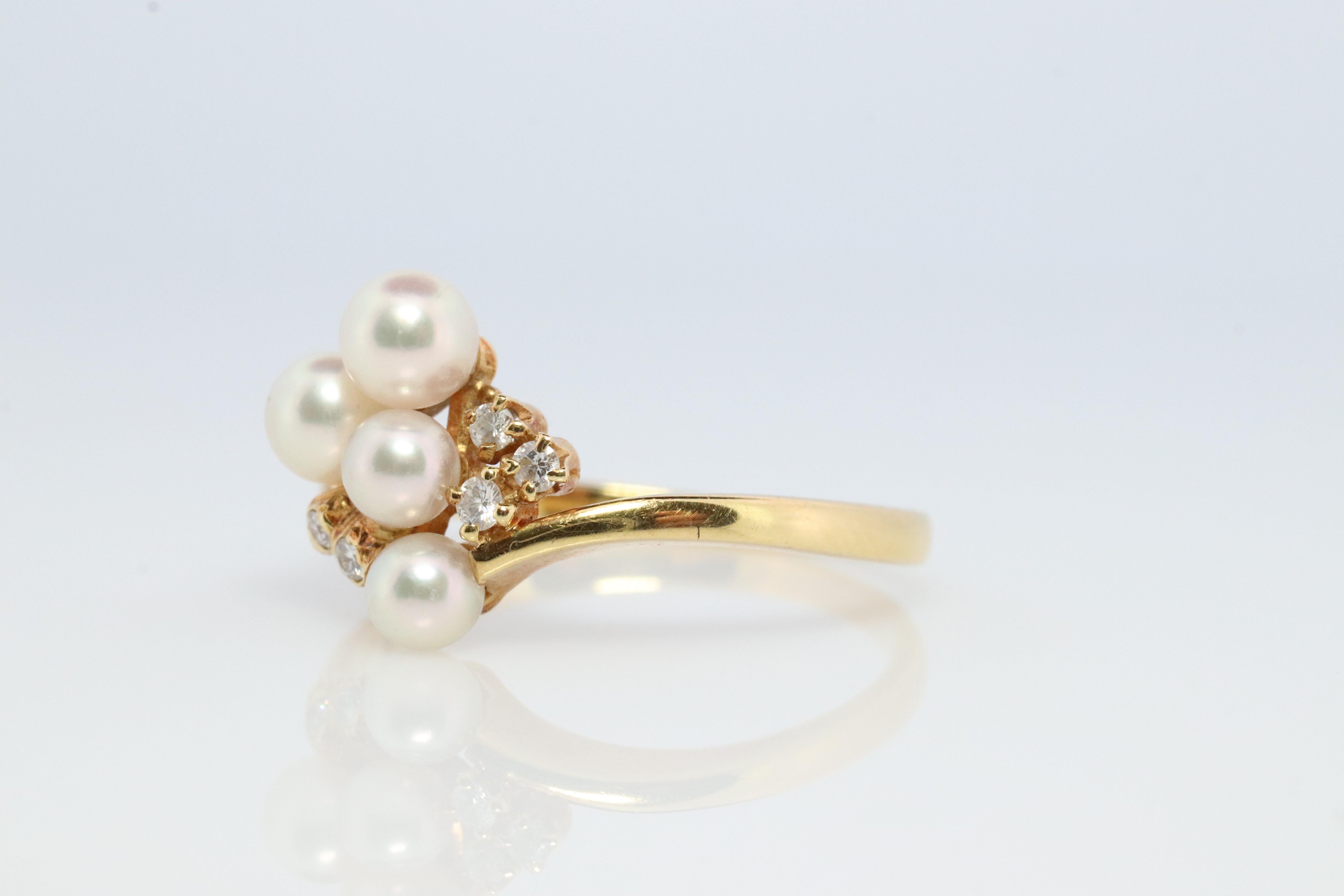 Genuine MIKIMOTO ring

18k Yellow Gold Diamonds and Pearls

MIKIMOTO Grape Motif

Details:
Size 7.5
Akoya pearls range from 3 to 4.5mm
1.5mm diamonds
2.6grams total