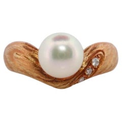 Anello Mikimoto. Solitario in oro 18k con perle e diamanti di Mikimoto. Mikimoto