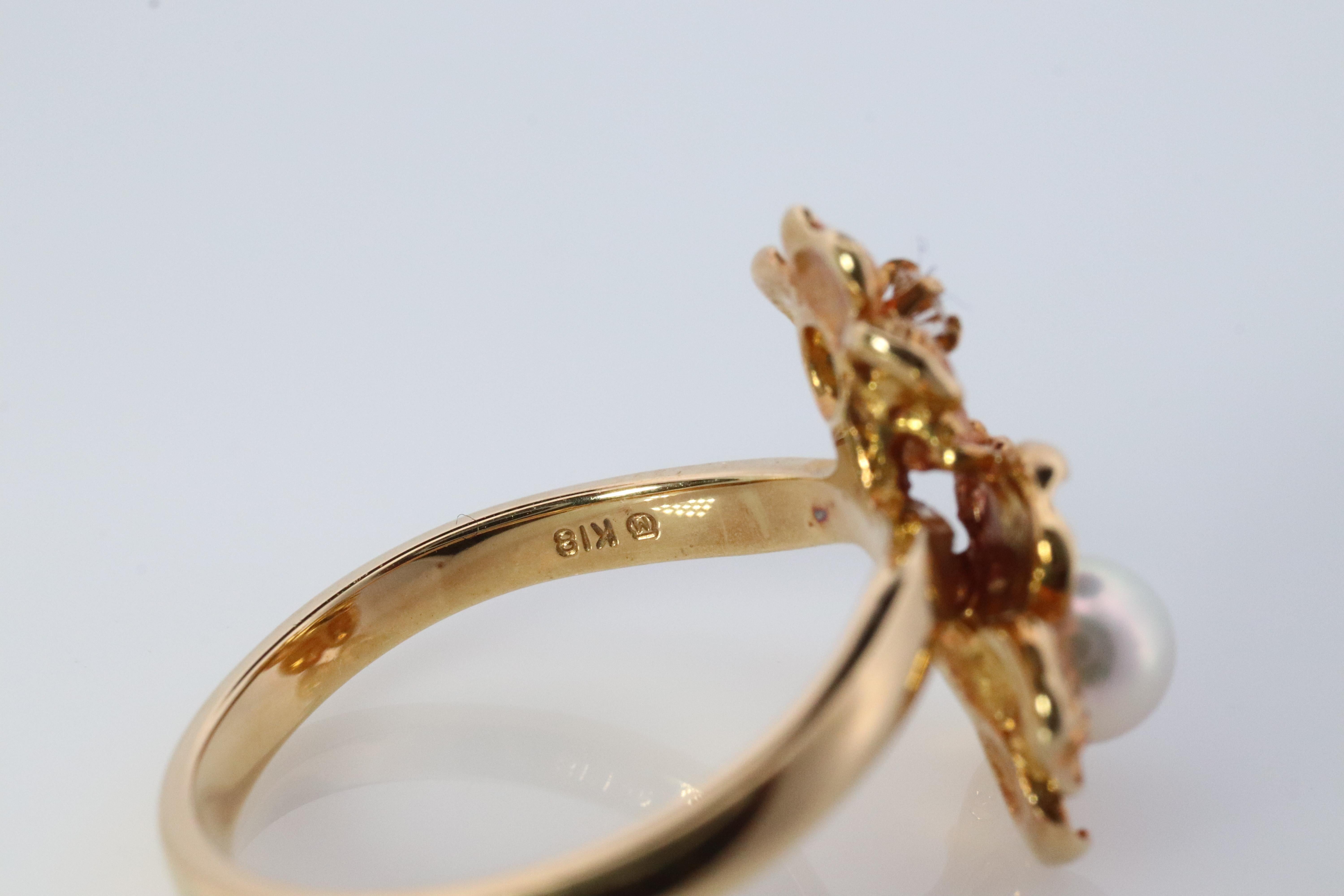Women's Mikimoto Ring. Vintage 18k Gold Mikimoto Pearl Diamond Double flower bypass ring For Sale
