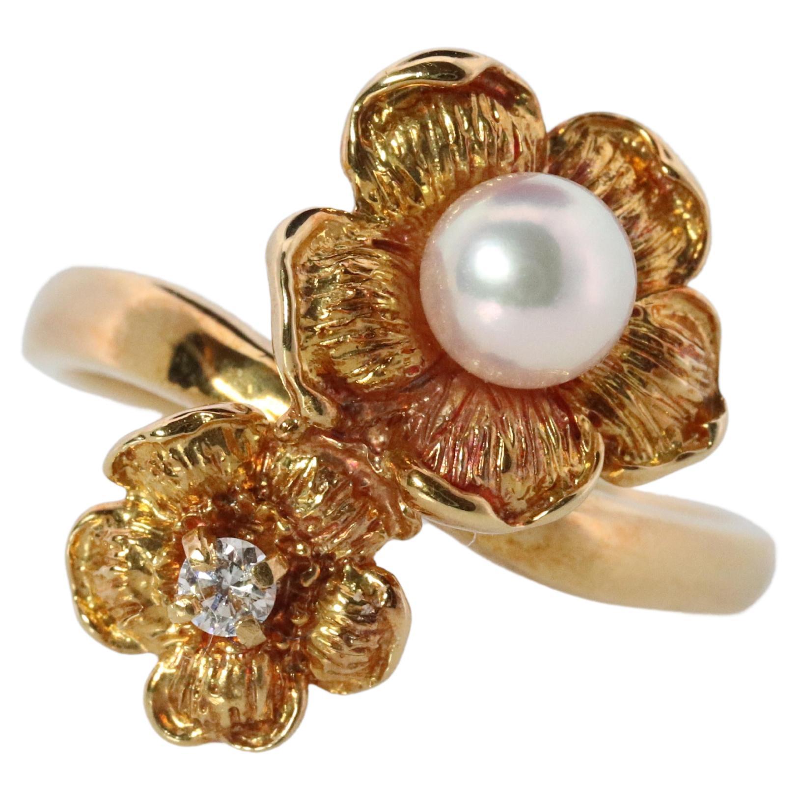 Mikimoto Ring. Vintage 18k Gold Mikimoto Pearl Diamond Double flower bypass ring