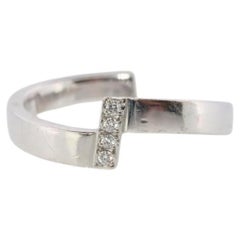 Mikimoto Ring. Vintage 750 Mikimoto Diamond Shifted ring. Mikimoto Diamond