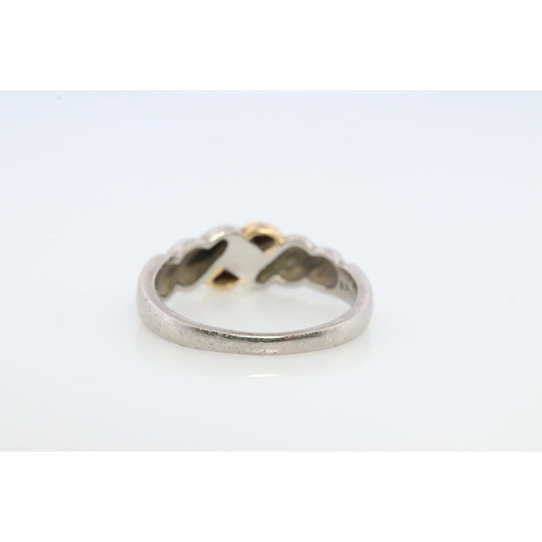 Vintage from the 1990s
Size: 6 US
Materials: Gold, Platinum

Gemstone: Diamond

Style: Minimalist

Genuine MIKIMOTO ring

PT900 Platinum and 18k gold with Diamonds.

MIKIMOTO Pave diamond Twist design.

Details:
Size 6
0.06ctw Diamonds
5.3grams total