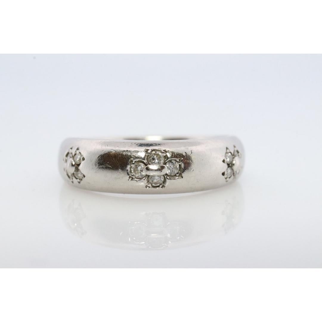 Vintage from the 1990s
Size: 6 US

Gemstone: Diamond

Style: Minimalist

Genuine MIKIMOTO ring

PT900 Platinum with Diamonds.

MIKIMOTO Pave diamond Clover design.

Details:
Size 6
0.09ctw Diamonds
6.1grams total