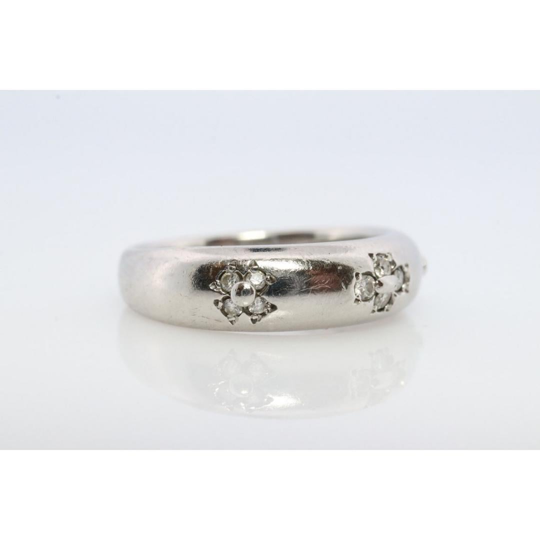 Mikimoto Ring. Vintage Platinum Mikimoto Diamond Bezel set ring. In Good Condition For Sale In Port Charlotte, FL