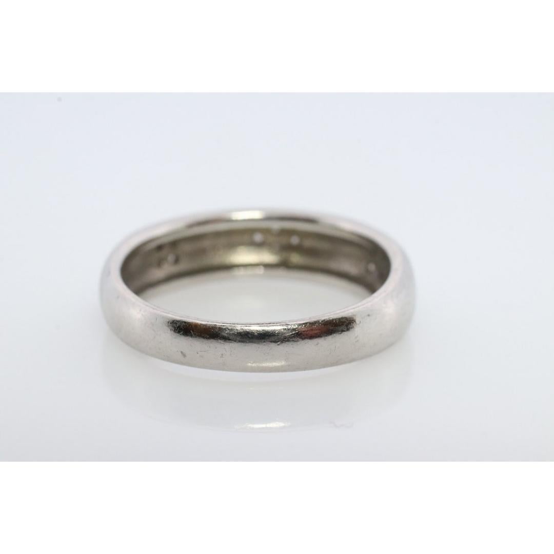 Mikimoto Ring. Vintage Platinum Mikimoto Diamond Bezel set ring. For Sale 2