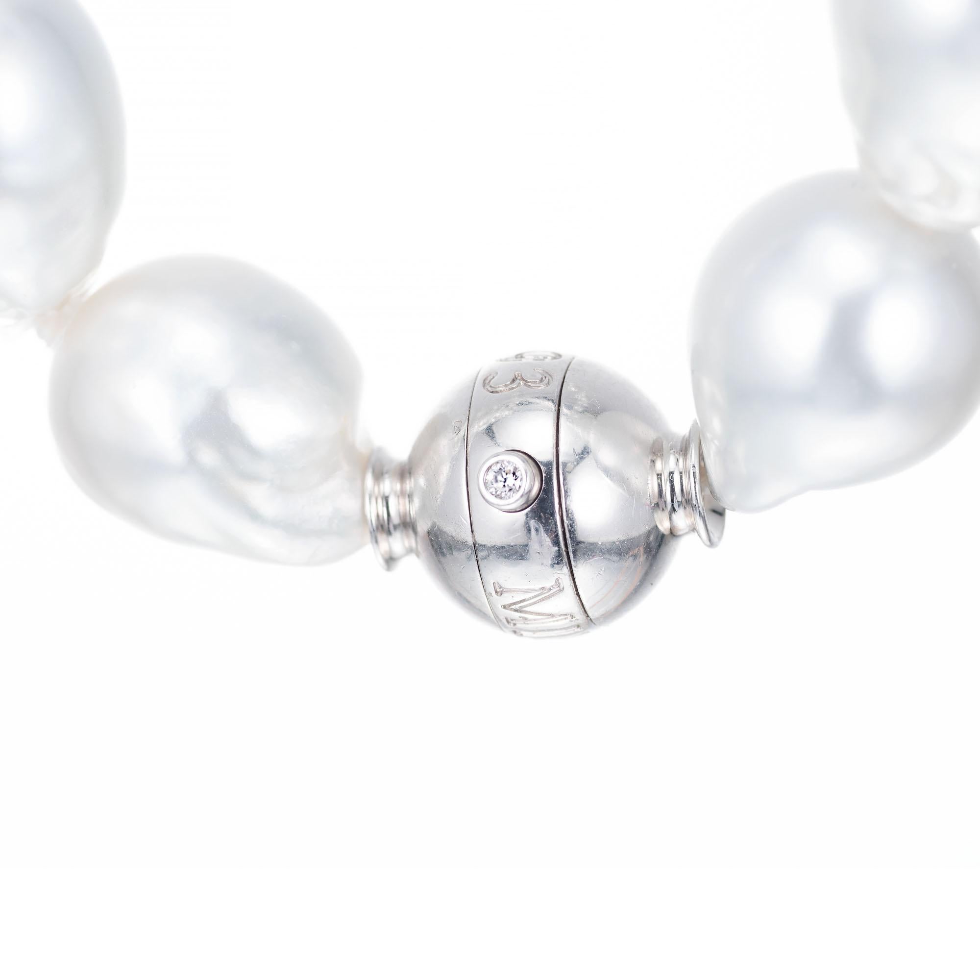Mikimoto baroque south sea cultured pearl necklace with long silver white high lustre pearls with beautiful blue overtones and 18k white gold hammered catch 

25 south sea baroque pearls silvery white bluish overtone good lustre, few to moderate