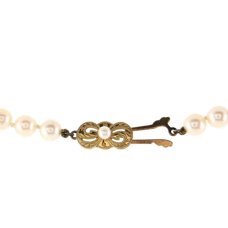 Mikimoto Single Strand Necklace Round Cultured Pearls with 18K Yellow Gold In Good Condition In New York, NY