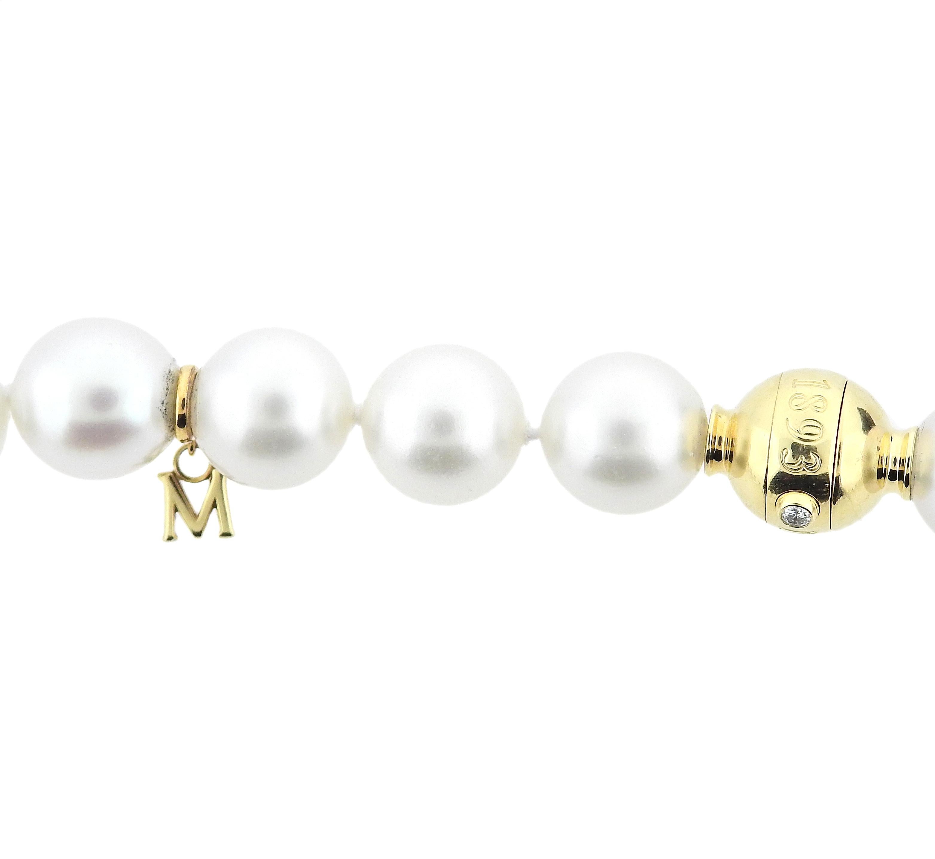 Mikimoto South Sea pearl 18k gold necklace, featuring 10.2-12.4mm A+ SS pearls and one diamond on the clasp. Necklace measures 18.5