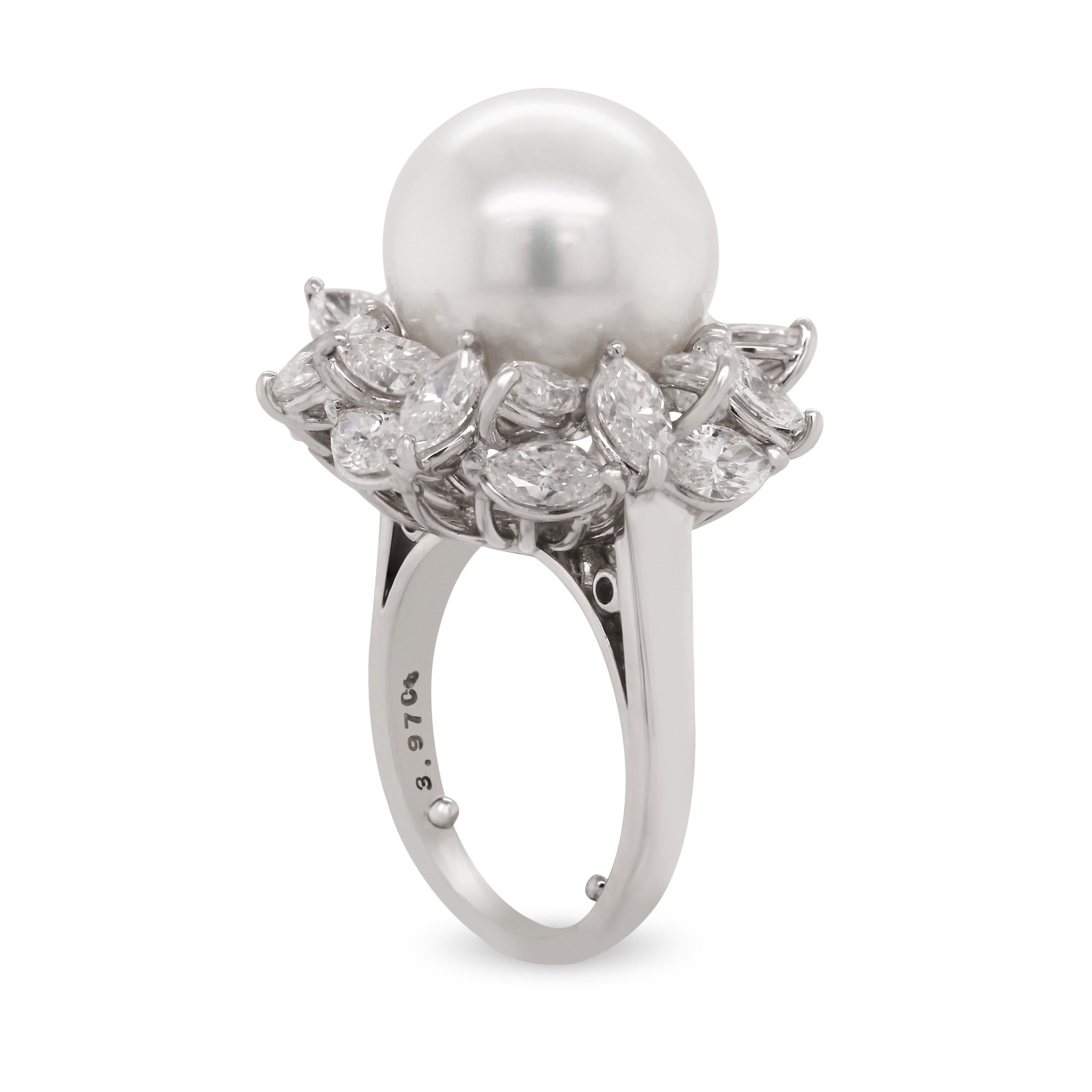 Mikimoto South Sea Pearl Marquise Diamond 18 Karat White Gold Cocktail Ring

This state-of-the-art ring by Mikimoto features a 13.5mm South Sea Pearl center surrounded with marquise diamonds.

3.97 carat F-G color, VVS1-VS1 clarity diamonds

Ring