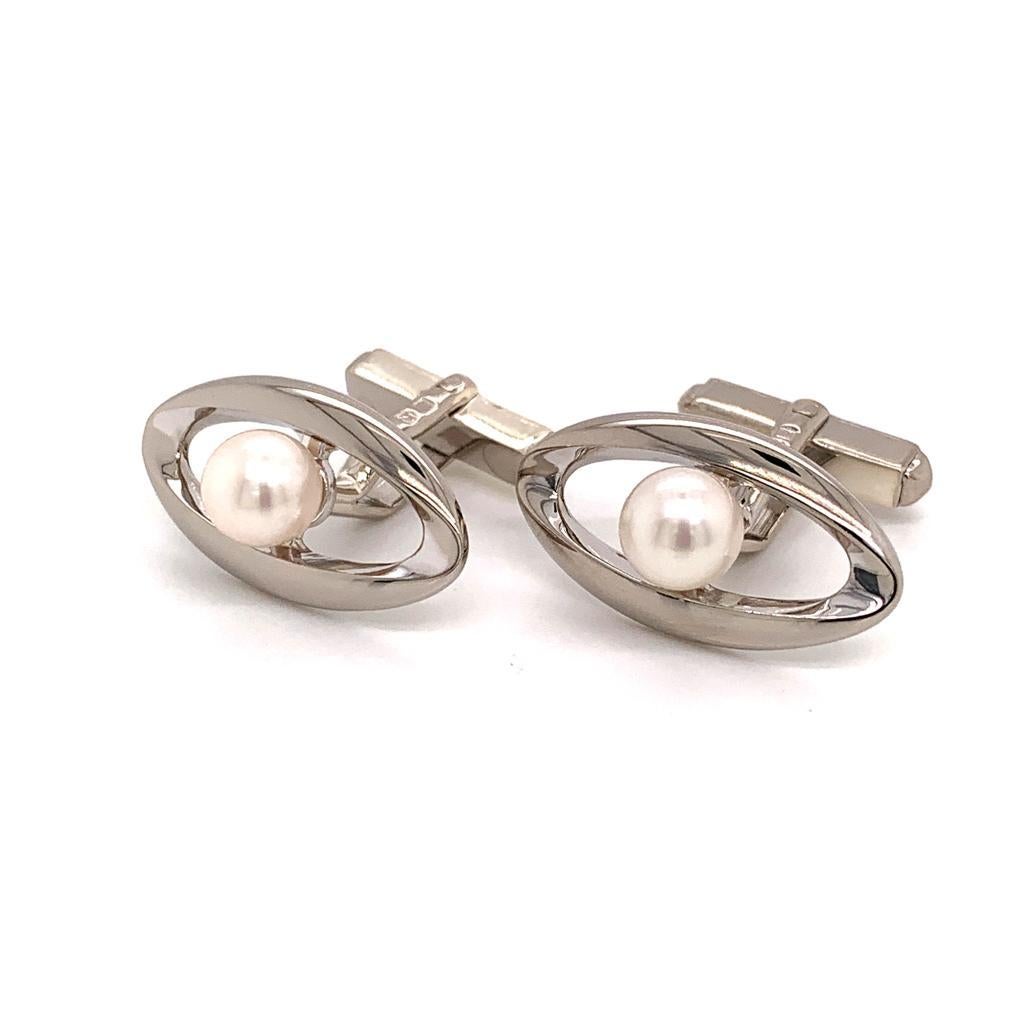 MIKIMOTO STERLING SILVER CUFFLINKS 4.54 GRAMS 6.65 MM PEARLS M128

TRUSTED SELLER SINCE 2002

PLEASE SEE OUR HUNDREDS OF POSITIVE FEEDBACKS FROM OUR CLIENTS!!

FREE SHIPPING

This elegant Authentic Mikimoto Men's Sterling Silver Cuff-links has 2