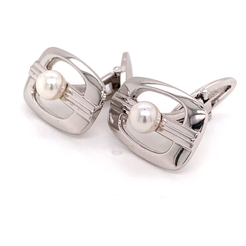 MIKIMOTO STERLING SILVER CUFFLINKS 6.14 GRAMS 6 MM PEARLS M125

TRUSTED SELLER SINCE 2002

PLEASE SEE OUR HUNDREDS OF POSITIVE FEEDBACKS FROM OUR CLIENTS!!

FREE SHIPPING

This elegant Authentic Mikimoto Men's Sterling Silver Cuff-links has 2