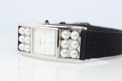 Mikimoto Sterling Silver Watch. Mikimoto Pearl and MOP Dial ladies watch