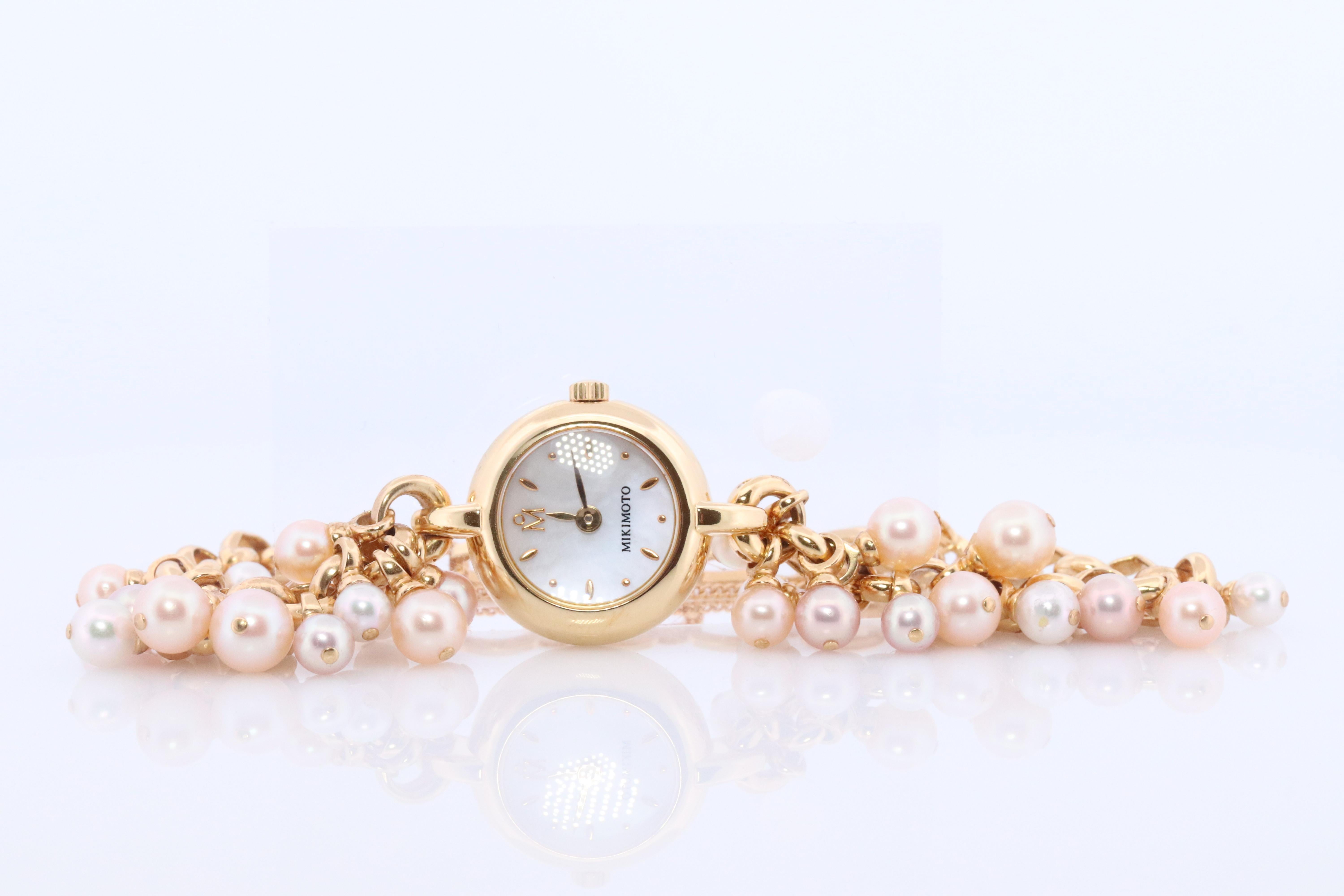Genuine MIKIMOTO Watch

Dangling Pearl Candy Bracelet.
White Dial.

MIKIMOTO hallmarked accordingly

Gold Plated. Quartz Movement with New Battery installed.

Details:

Adjustable Wrist Size.


Comes with Original Paperwork and Original Mikimoto Box.