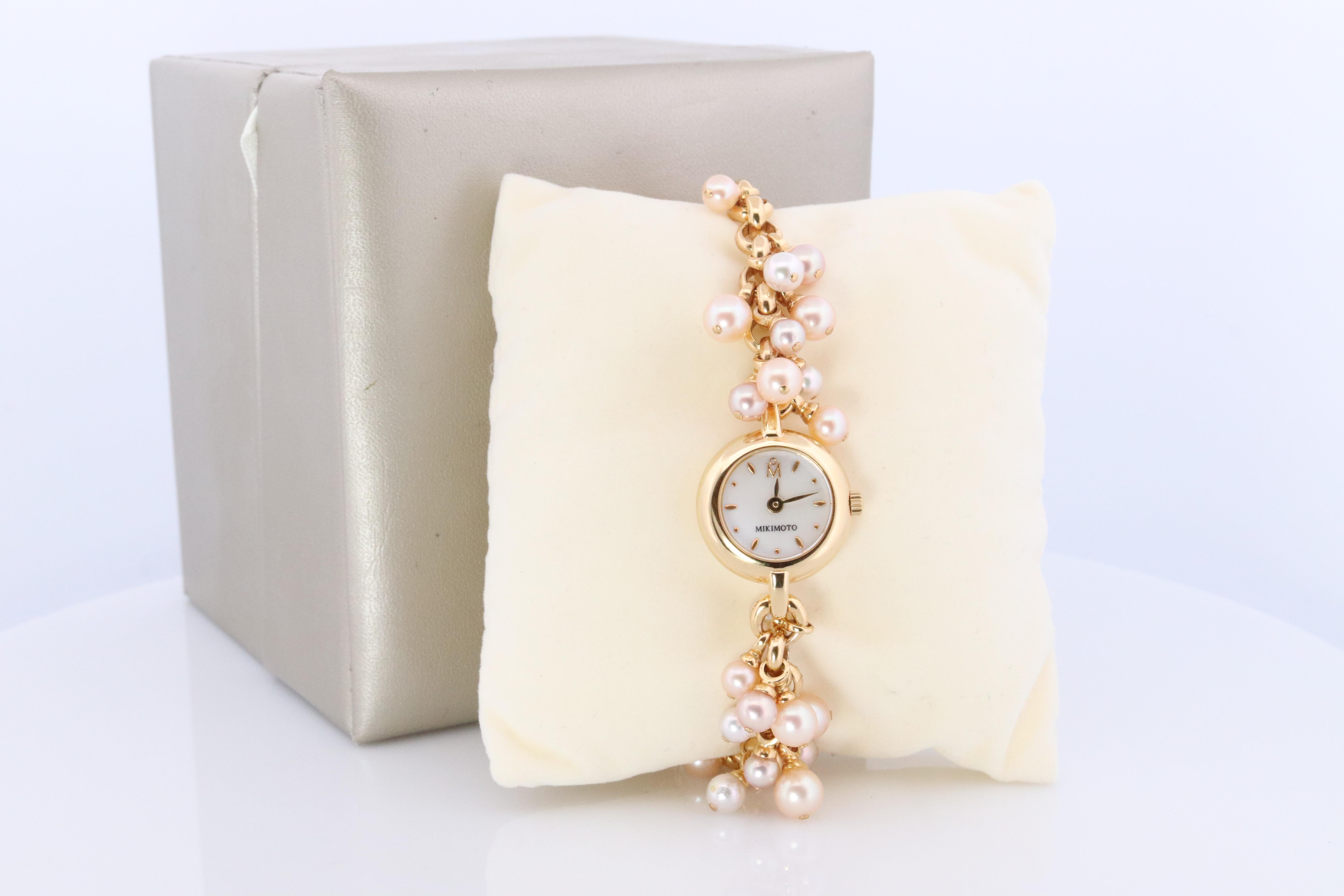 Round Cut Mikimoto Watch. Mikimoto Pearl Dangle Bracelet Ladies Watch. Dial