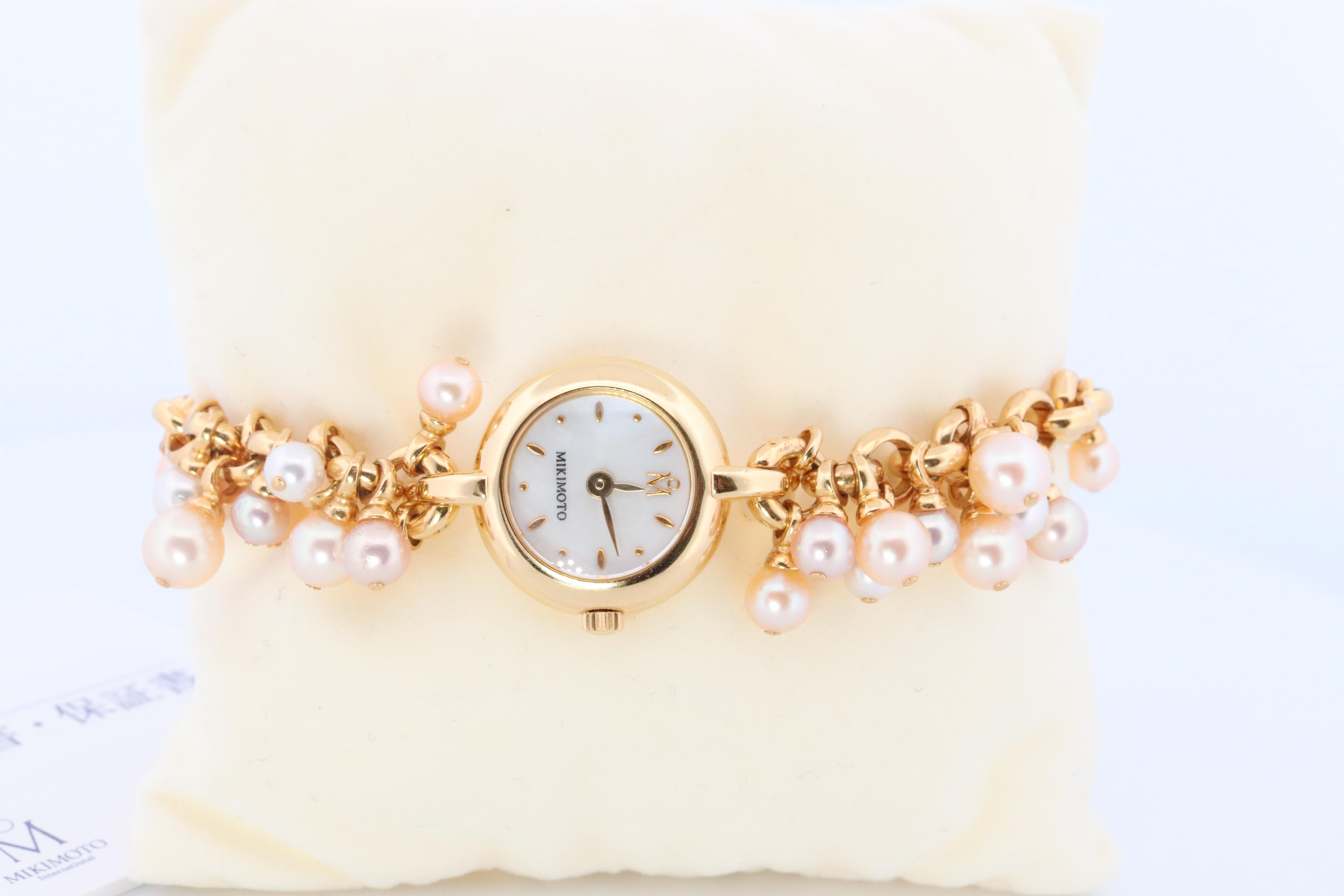 Women's Mikimoto Watch. Mikimoto Pearl Dangle Bracelet Ladies Watch. Dial