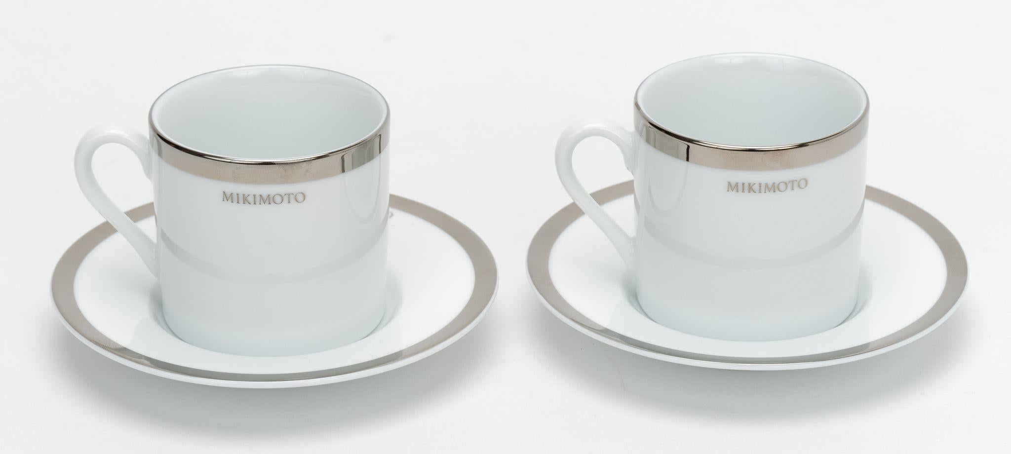 Mikimoto White and Platinum set of 2 coffee caps and saucers. Excellent condition.
Comes with original box.