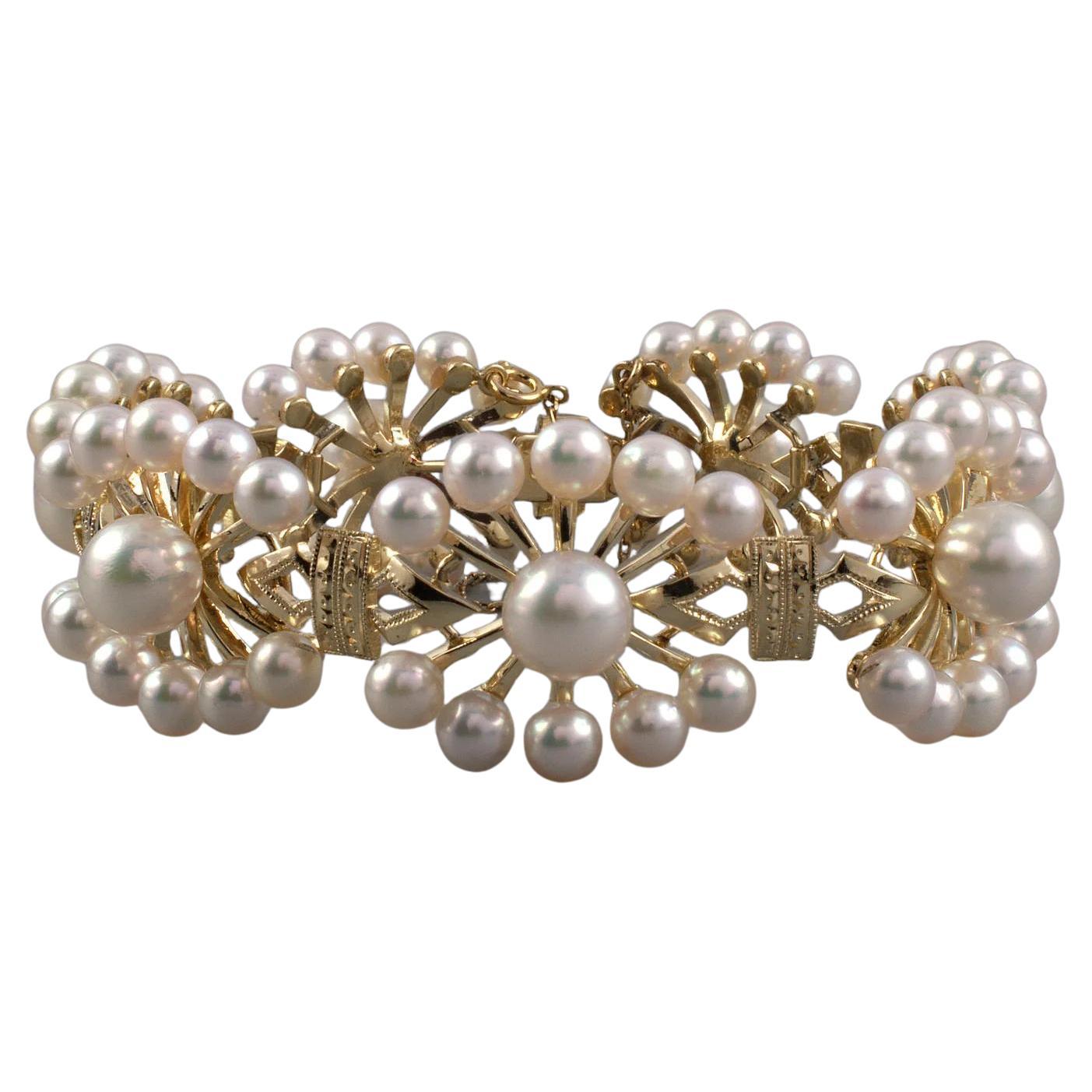 Mikimoto Yellow Gold 7 Floral Pearl Section links Bracelet For Sale