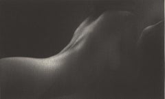Plentitude (a young sensual woman arches her back and stokes our fantasies) 