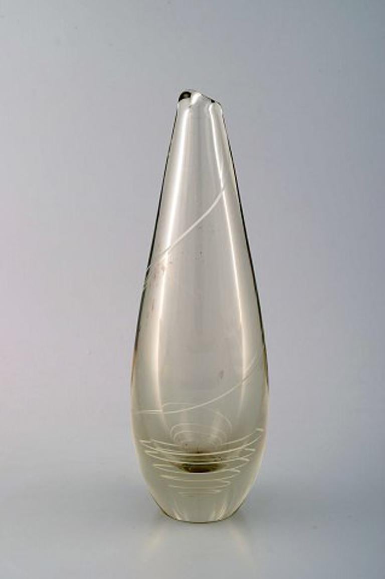 Mikko Helander for Humppila Lasi. Finnish art glass. Spiral decorated vase.
Signed: Helander.
Measures: 22 cm x 7.5 cm.
In good condition.