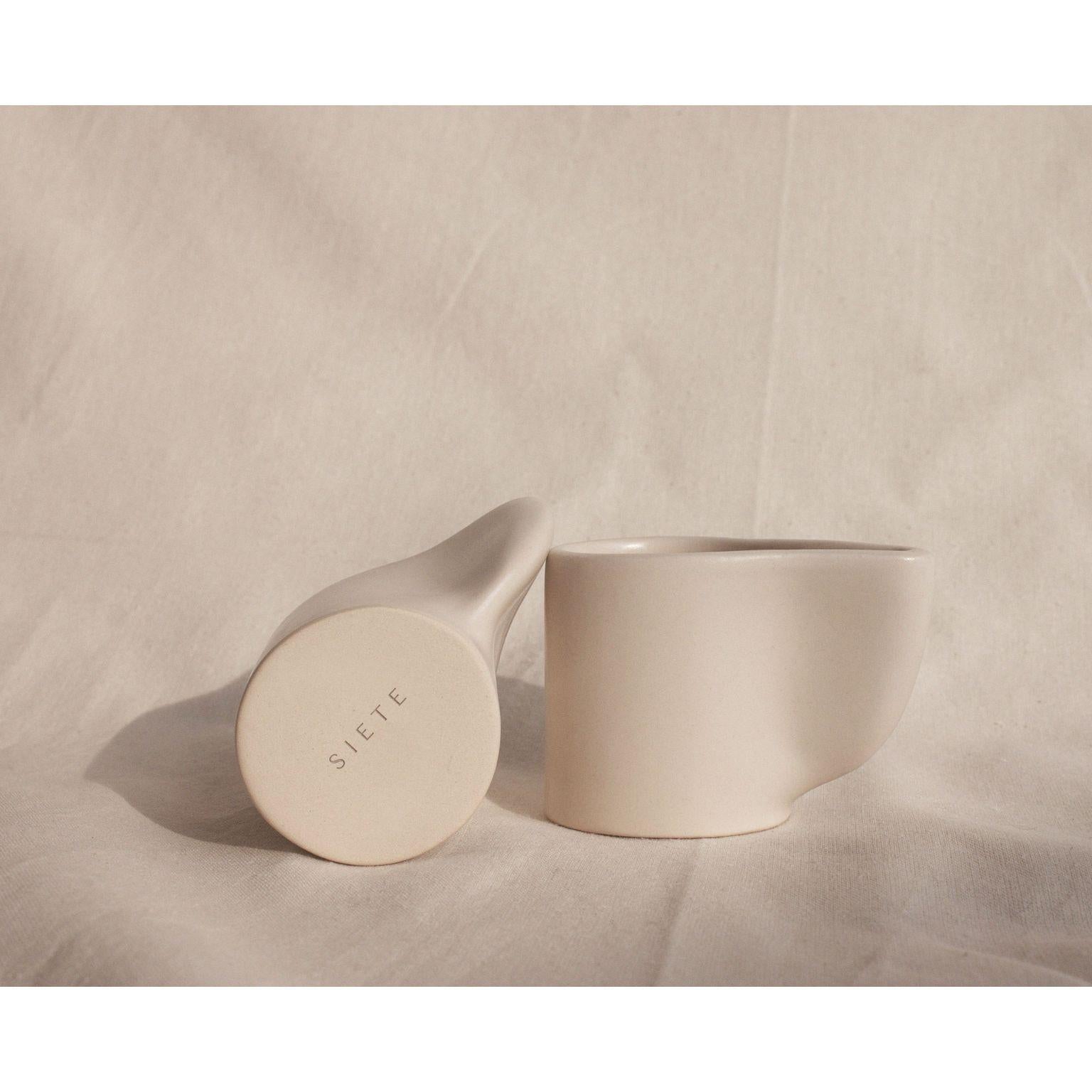 Mila Espresso Set by Siete Studio
Dimensions: D8.5 x W5 x H6 cm
Materials: Ceramic.
The Mila Espresso set includes two mugs and two plates. 

The simple yet earthy espresso cups are hand-made ceramic that go through the artisan process of