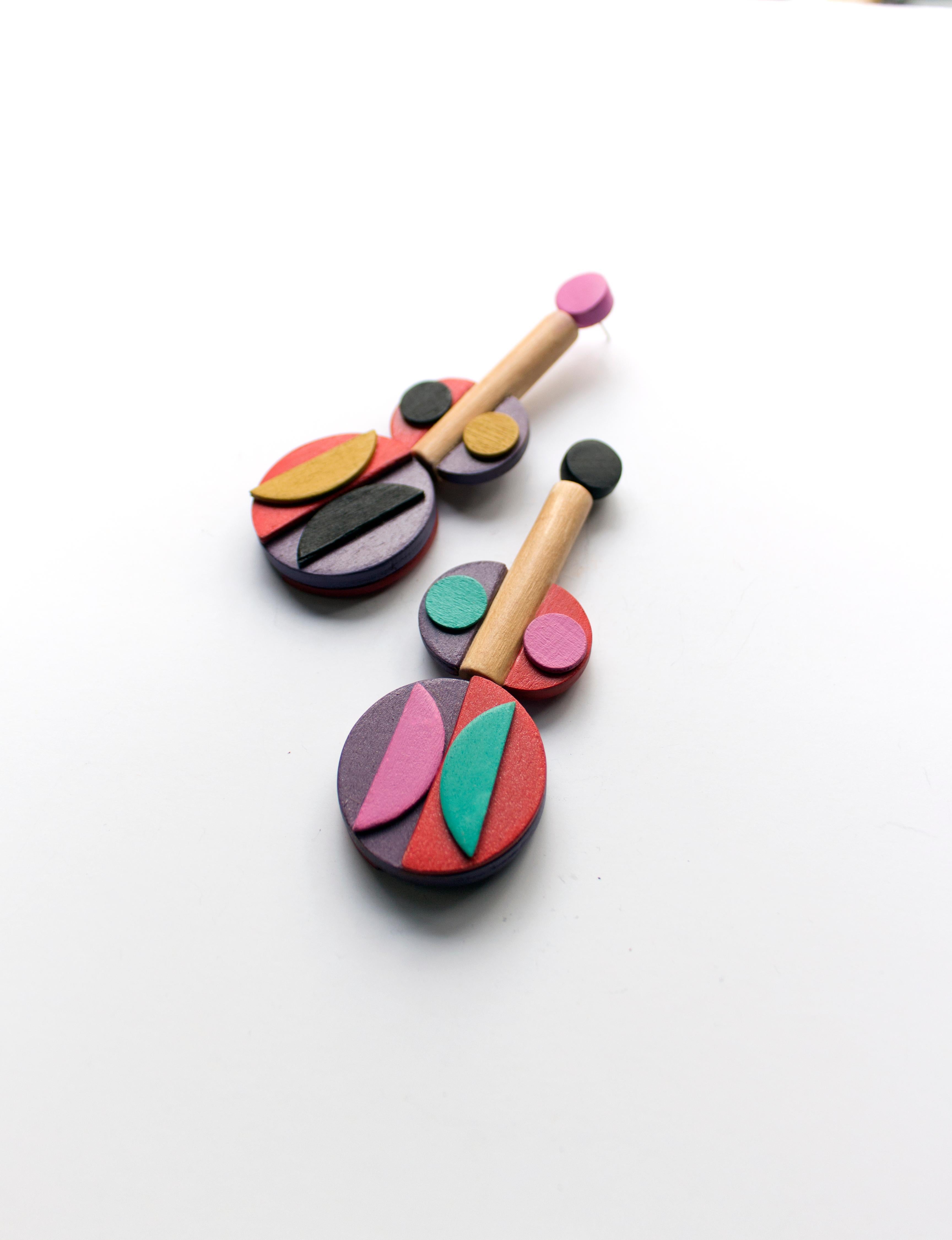 Large geometric Bauhaus-inspired wood dangle earrings of individually hand-cut and hand-painted shapes using a playful palette of bold, vivid colors.  Hypoallergenic stainless steel posts. 

All Hola Luna pieces are handcrafted one-off designs made