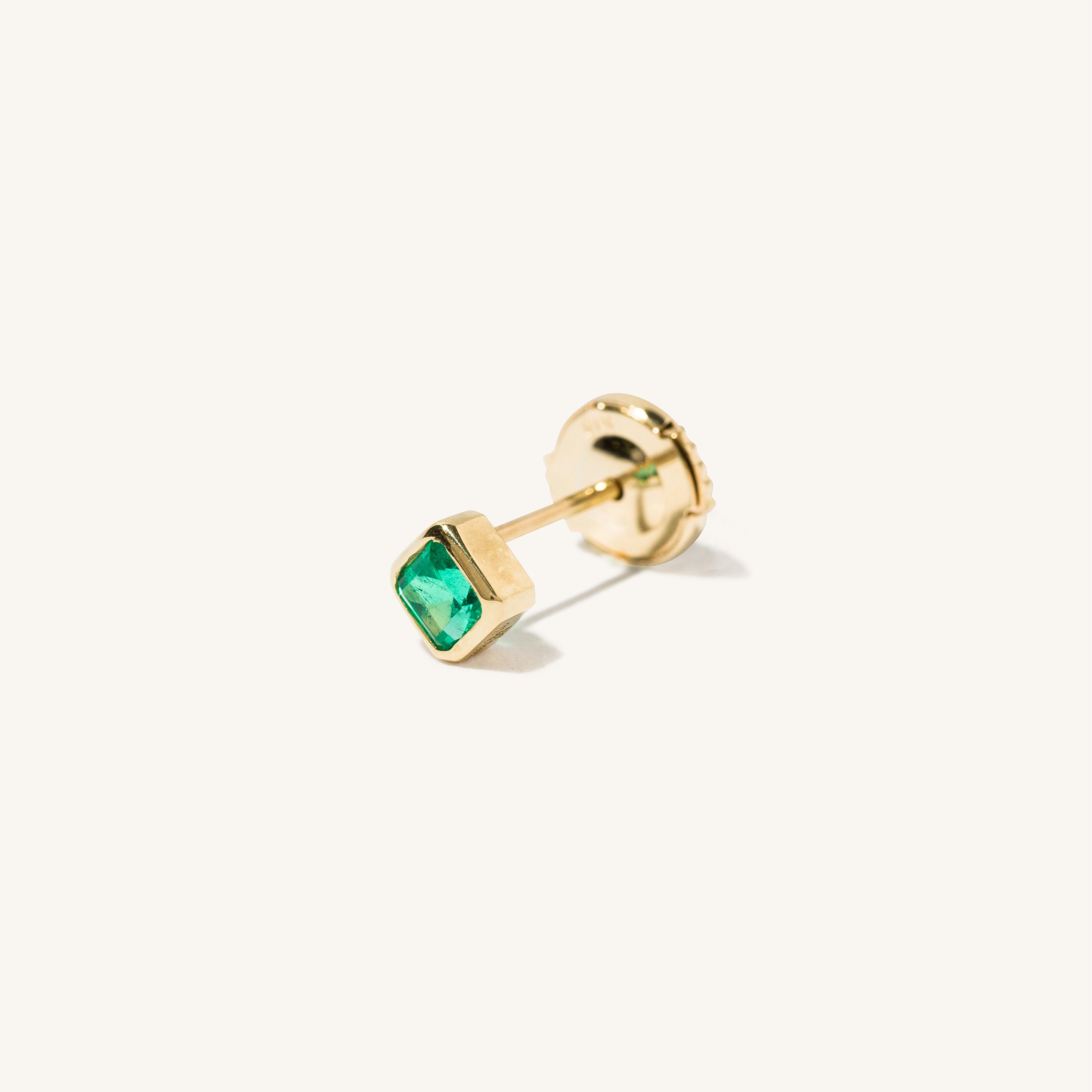 Milamore's one of a kind Emerald Earring. By working closely with our atelier in Japan, each earring is different and features a uniquely cut emerald set with 18 karat yellow gold. Please reach out to us via our 1st Dibs storefront for a selection