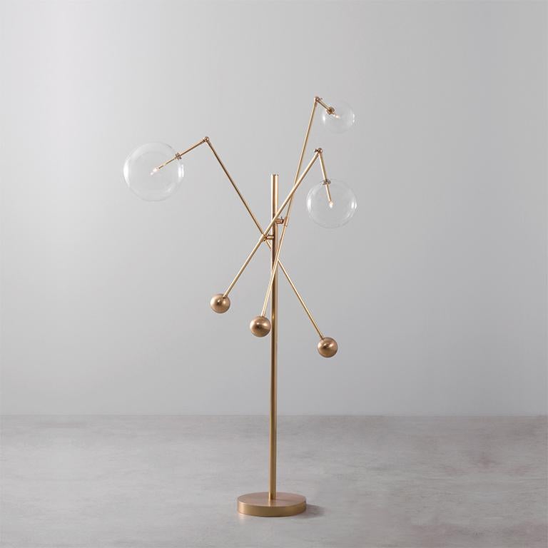 Milan 3 Arms Brass Floor Lamp by Schwung
Dimensions: H 182.5 x W 124 x D 124 cm
Materials: Natural brass, hand blown glass globes

Max wattage: 1.6W
Bulb base: G4, 12V AC
Lumens: 600lm
Colour temperature: 2700k
Maximum Bulb Diameter: