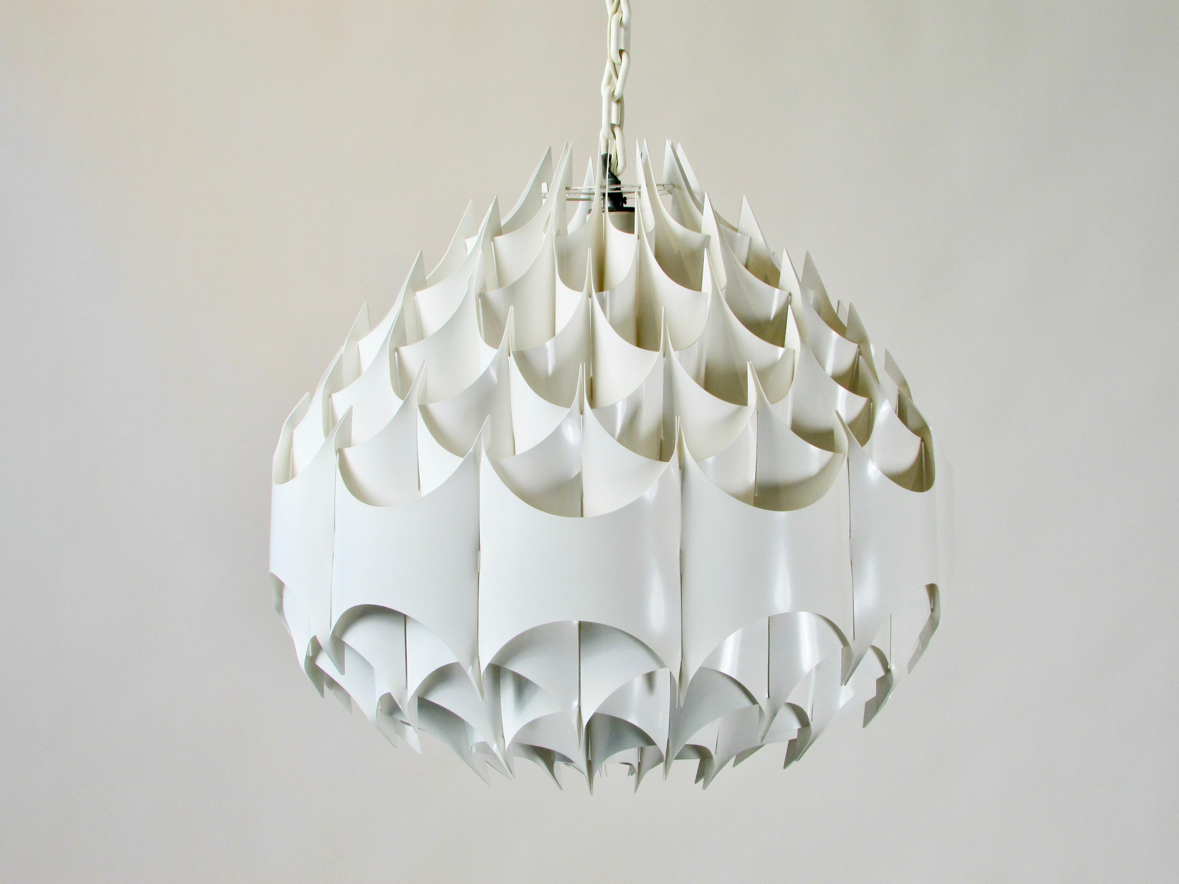 Designed be Havlova Miranda for Vest Leuchten Austria . Heat resistant white plastic elements interwoven to a delicate sculptural sphere form this space age hanging pendant lamp or chandelier .  
The principle of this design lies in the addition of
