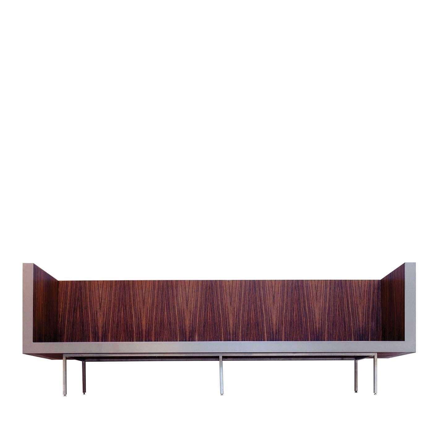 A spectacular design characterizes this remarkable seat, the Milano Bench. Sculpted from a single piece of rosewood and finished in a natural effect matt varnish, it features a supporting structure and front edging in elegant stainless steel. A 2002